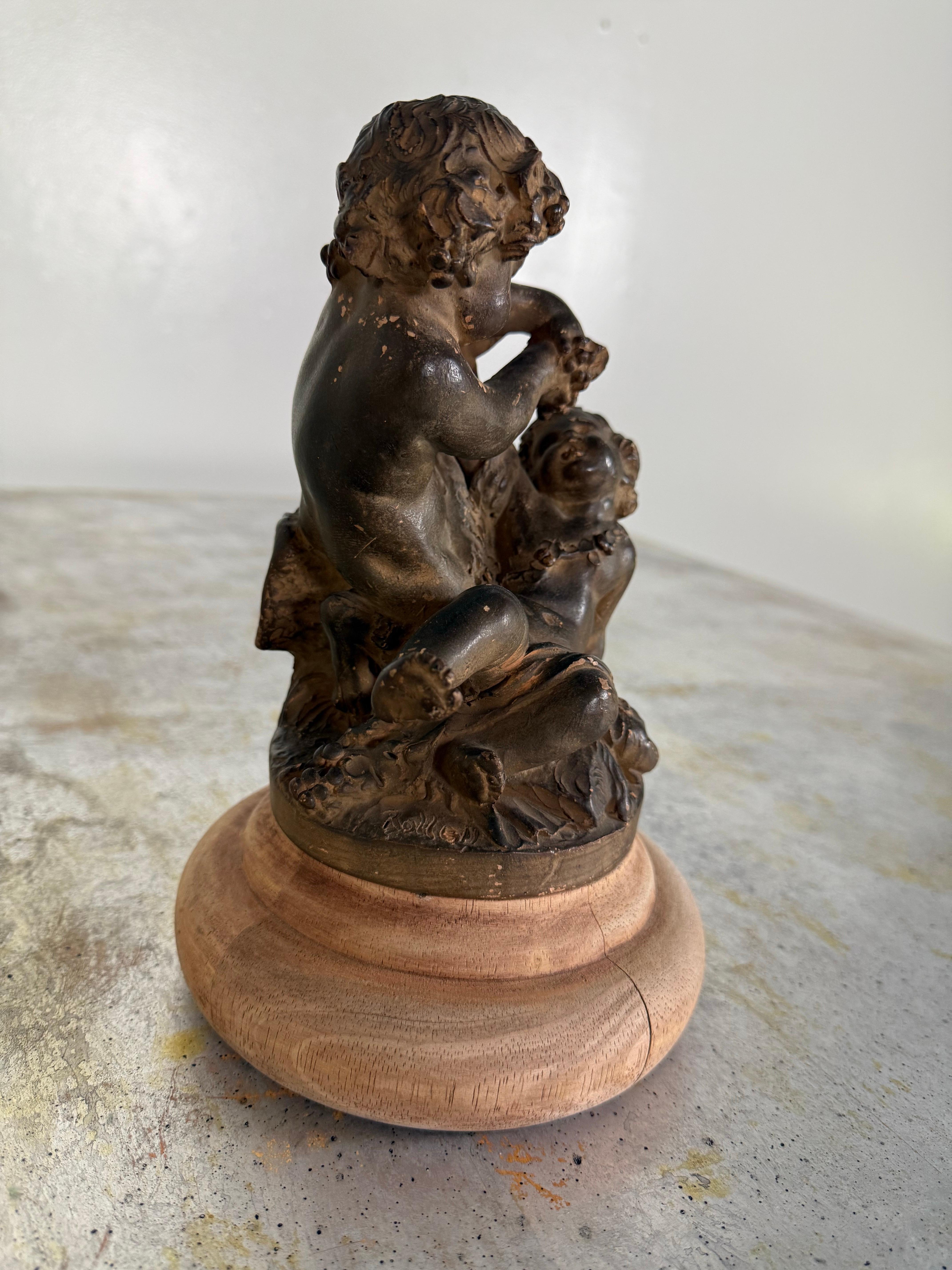 Rococo A.I.C. de Putti en terre cuite française du 19e siècle en vente
