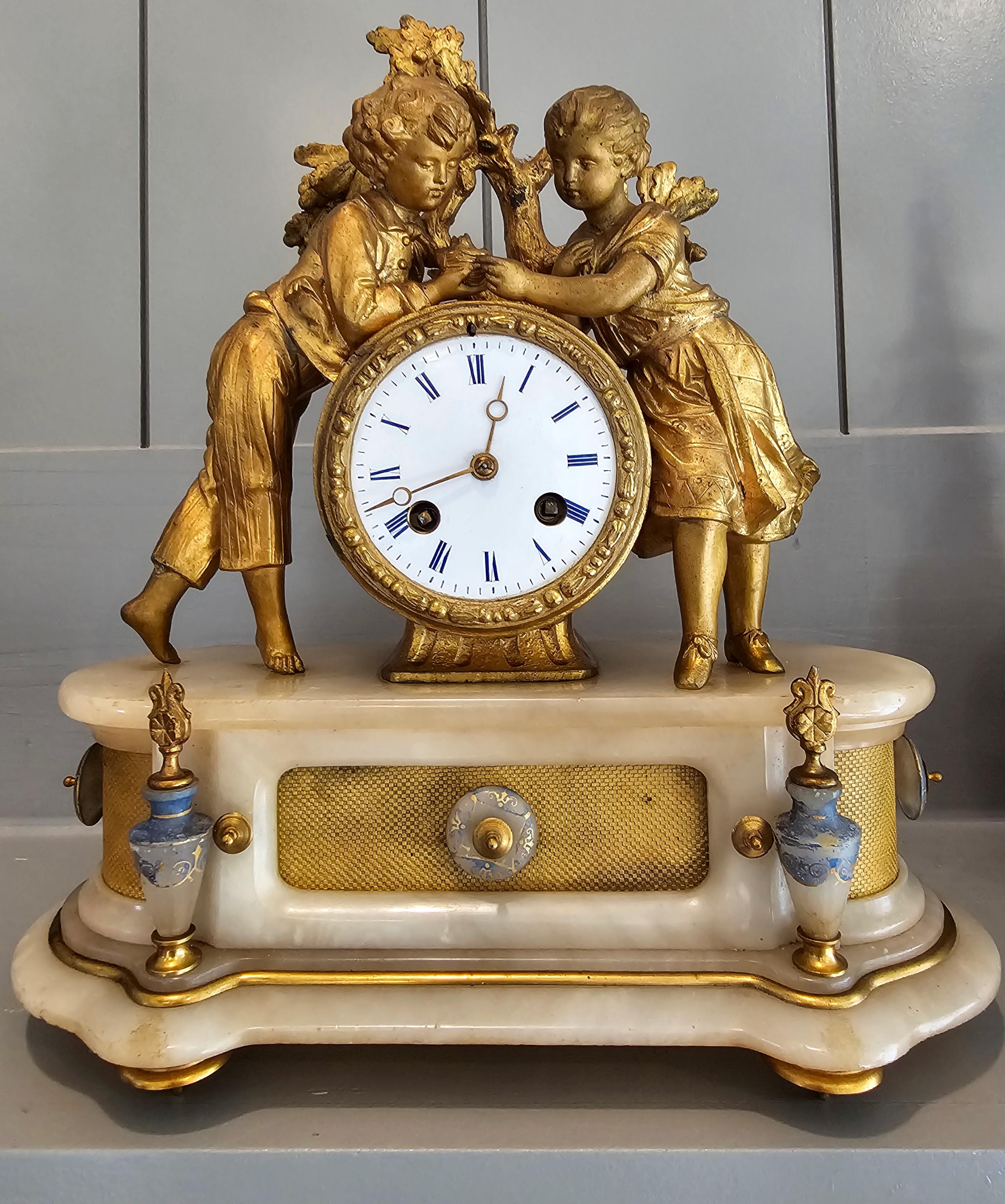 Elegant French Victorian era gilt bronze mounted alabaster antique mantel clock / shelf clock, attributed to master Parisian sculptor P.H. Mourey (1840-1910), with movement by renowned clockmaker Japey Frères (1776-1930s) circa 1870

Paris, France,