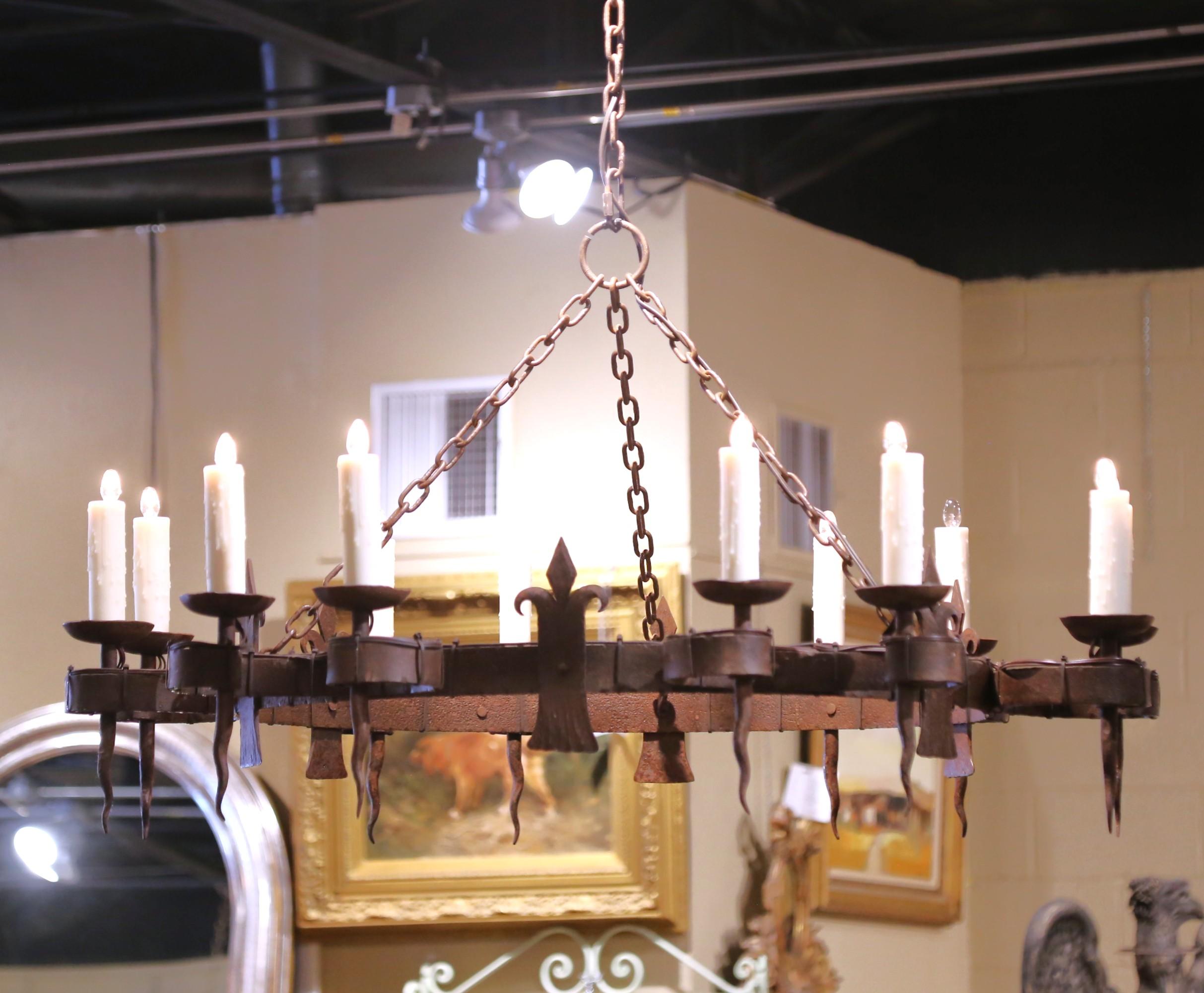 Gothic 19th C. French Wrought Iron Twelve-Light Chandelier with Fleur-de-Lys Motifs For Sale