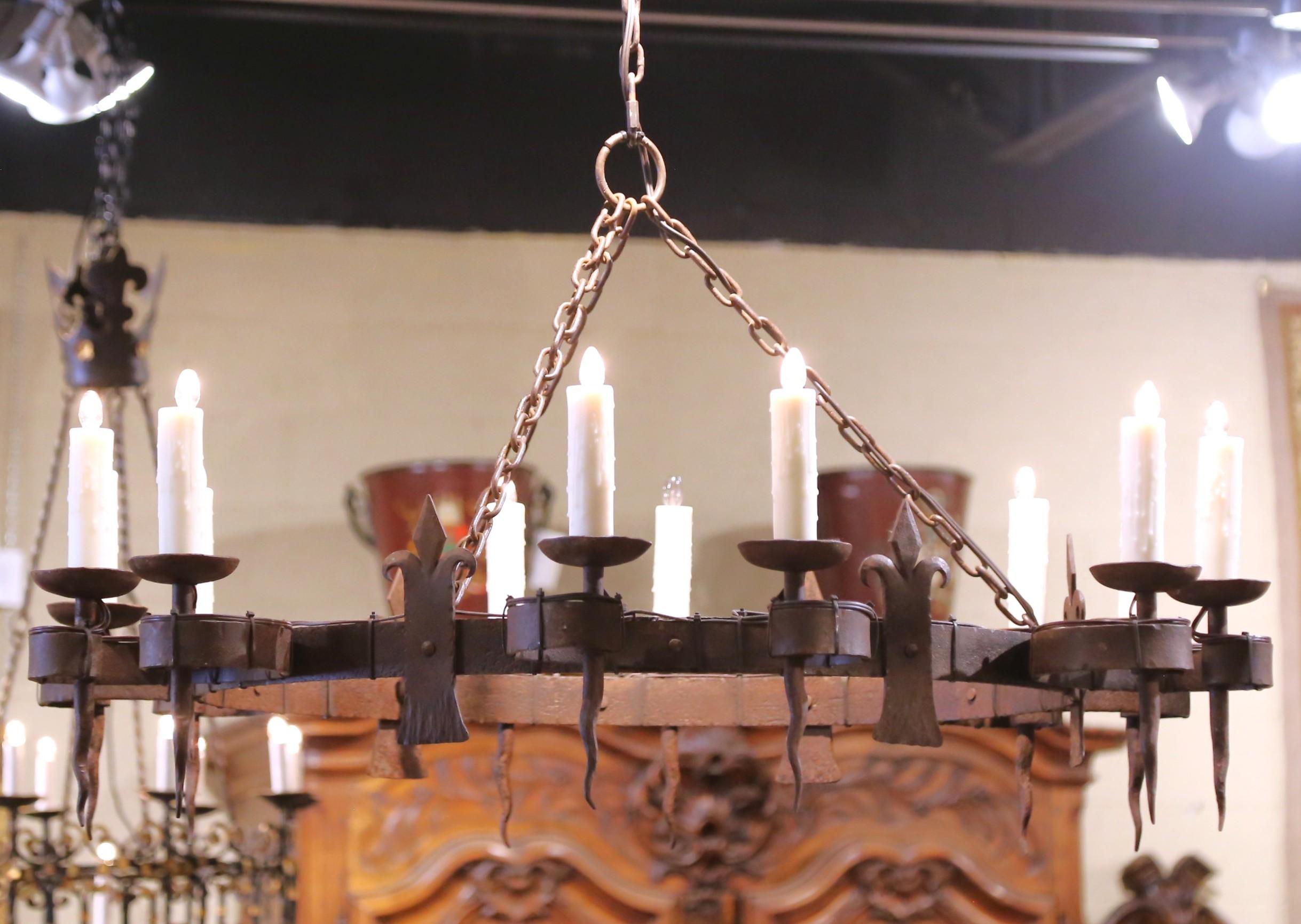 Forged 19th C. French Wrought Iron Twelve-Light Chandelier with Fleur-de-Lys Motifs For Sale