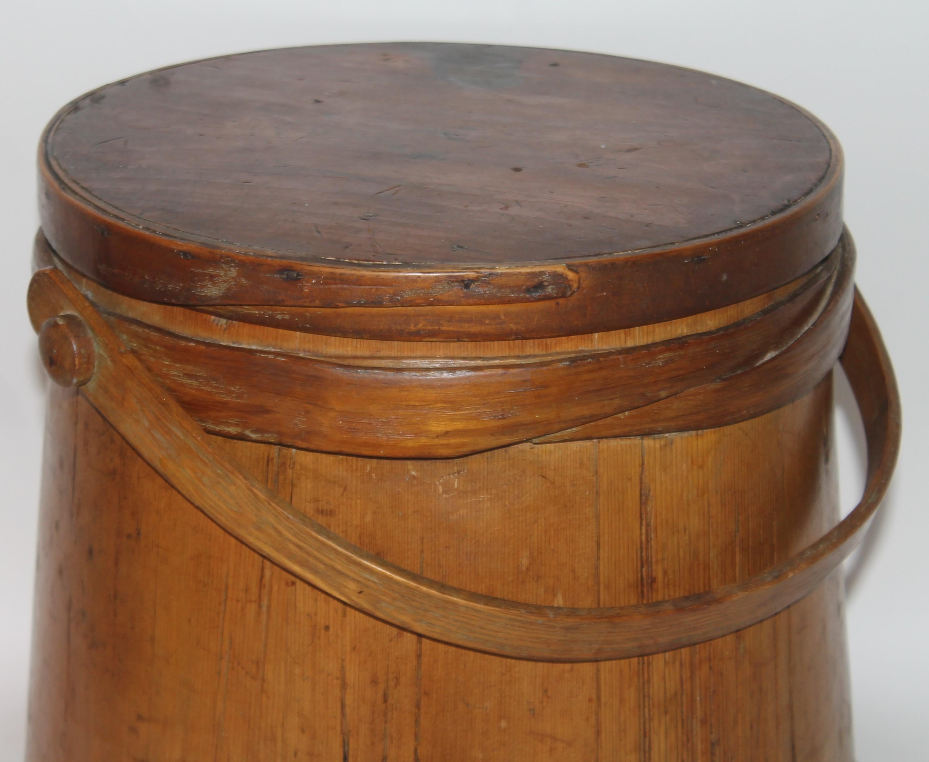 wooden bucket with lid