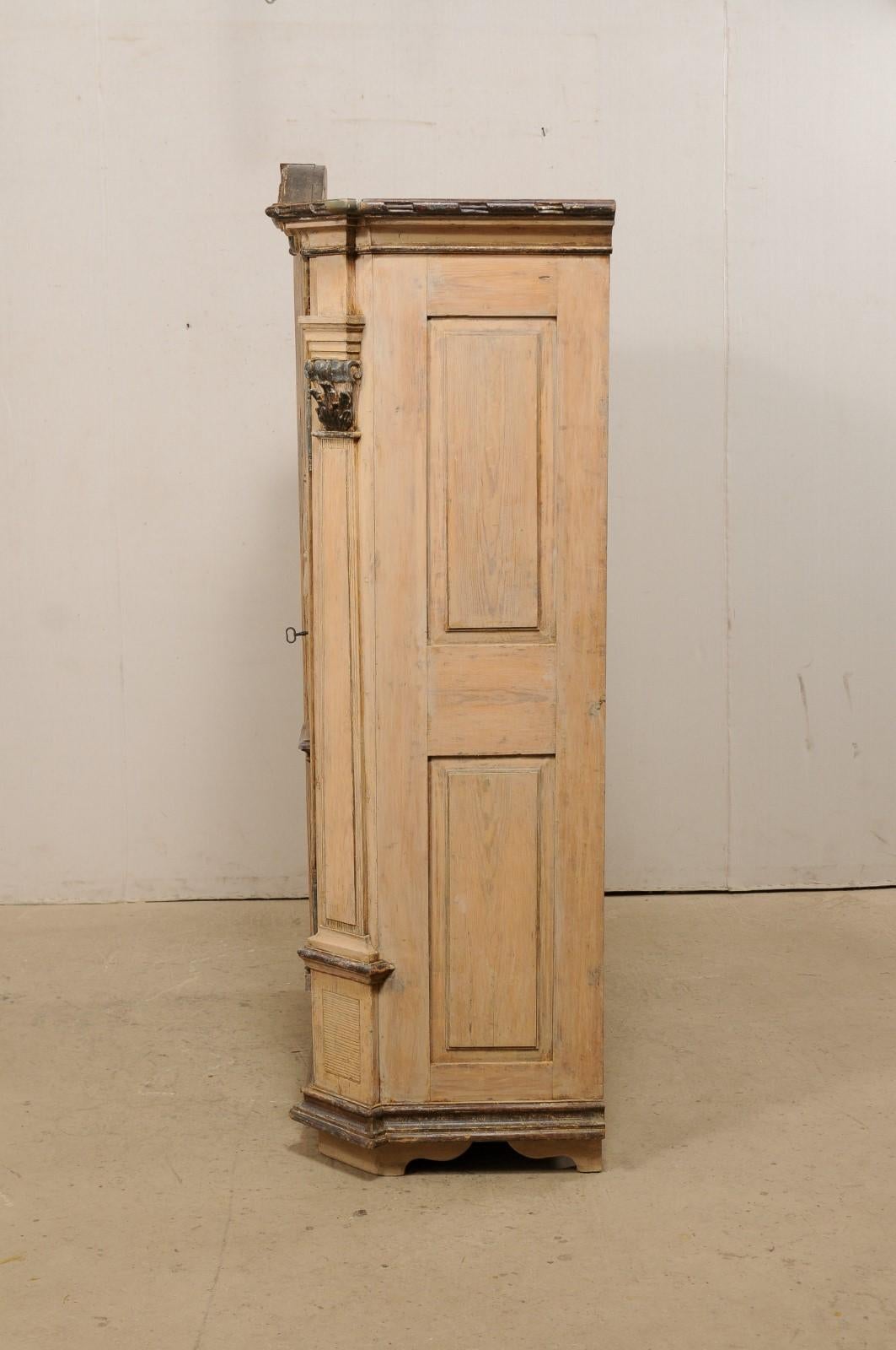19th C. German Tall Storage Cabinet w/ Arched Cornice & Decorative Carvings For Sale 3