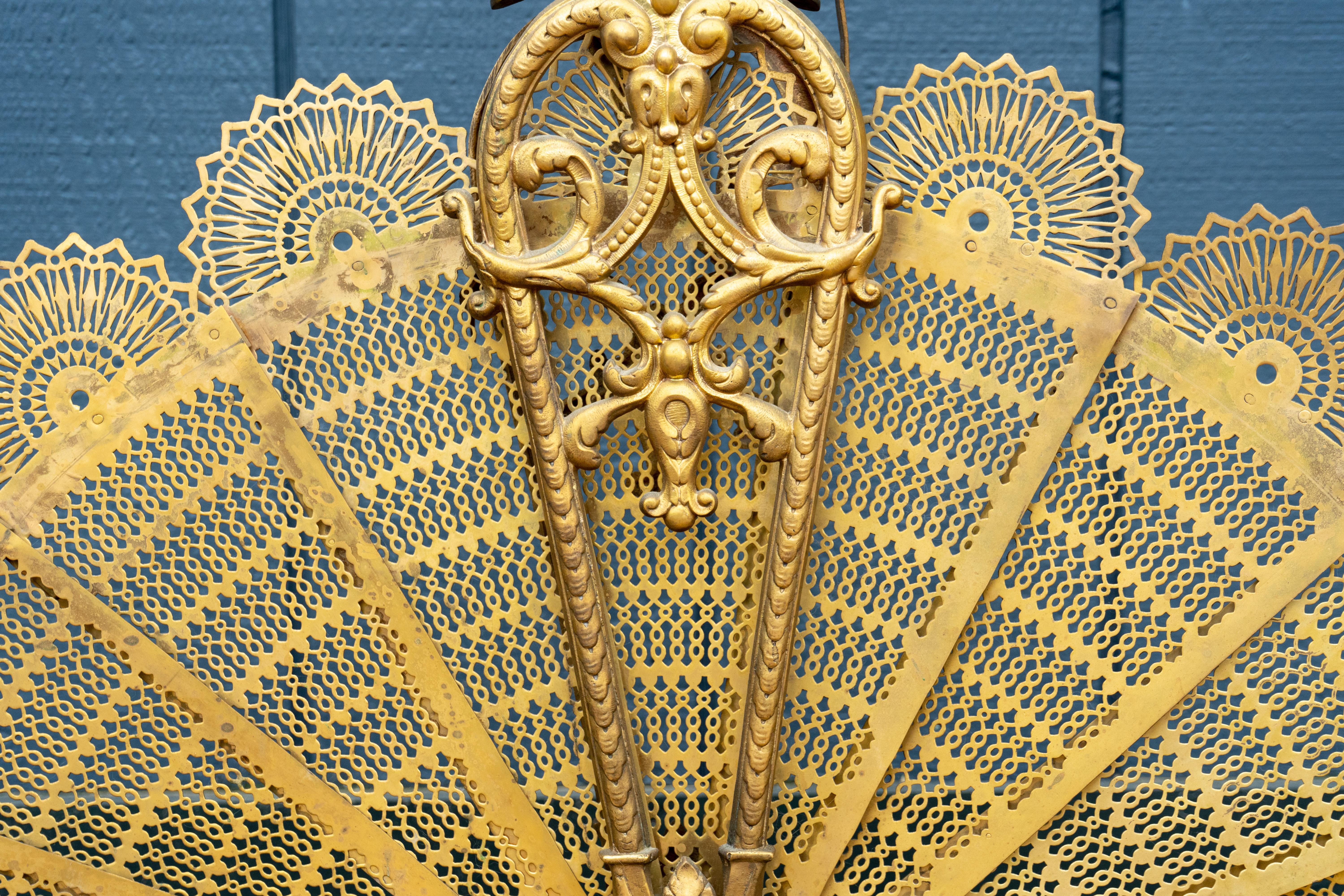 Enhance the opulence of your living space with this exquisite 19th century Gilt Fire Screen by renown Parisian metalsmith, Charles Casier, a masterful example of the Rococo style. Crafted with meticulous attention to detail, this fire screen is