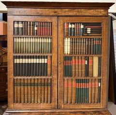 19th c Grain Painted Cabinet with Faux Book Paneled Doors, Probably English