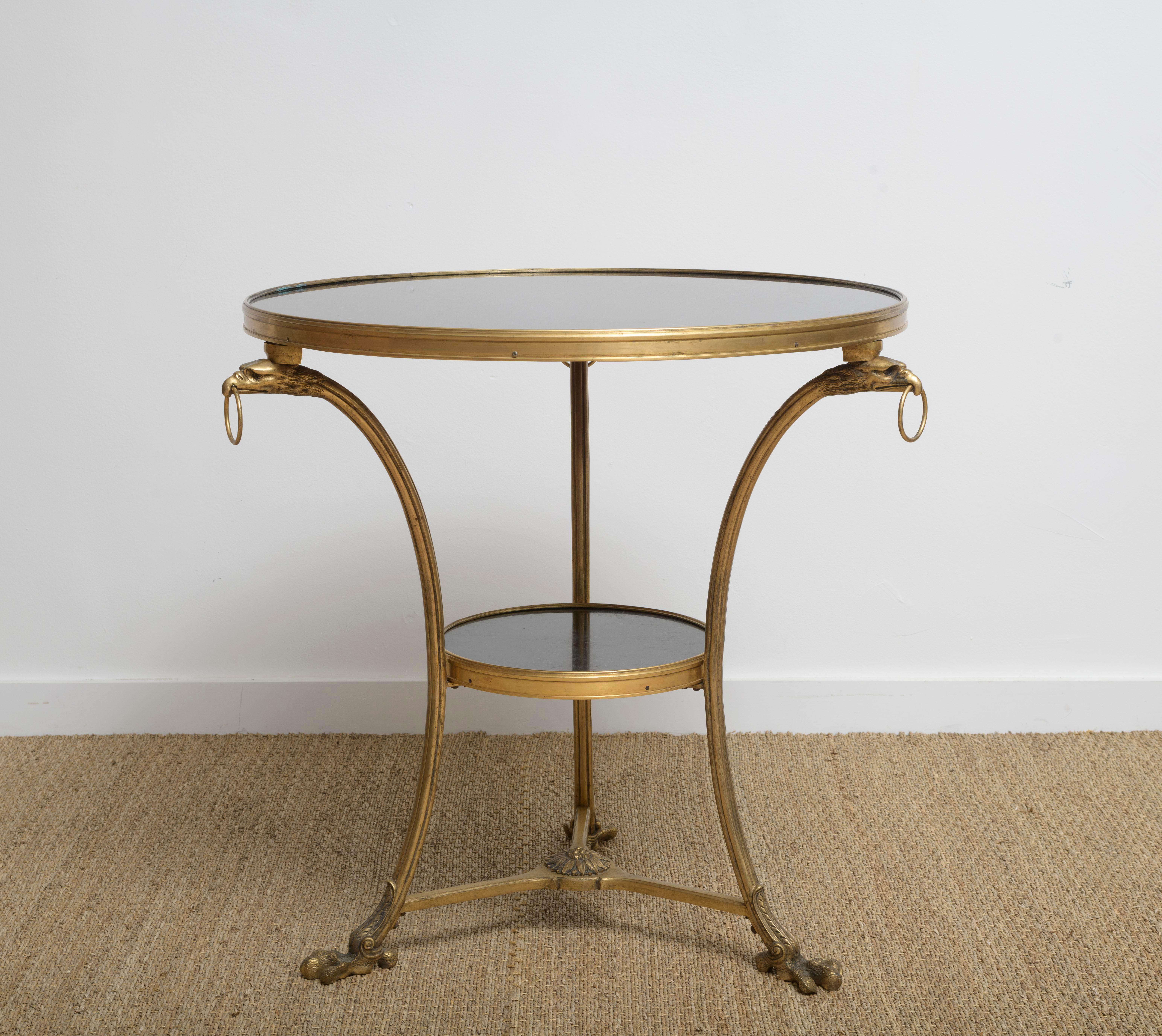 Antique French Brass & Black Marble Round Gueridon Table in the Empire Taste with Eagle Ring Handles and Talon Feet, late 19th century 
