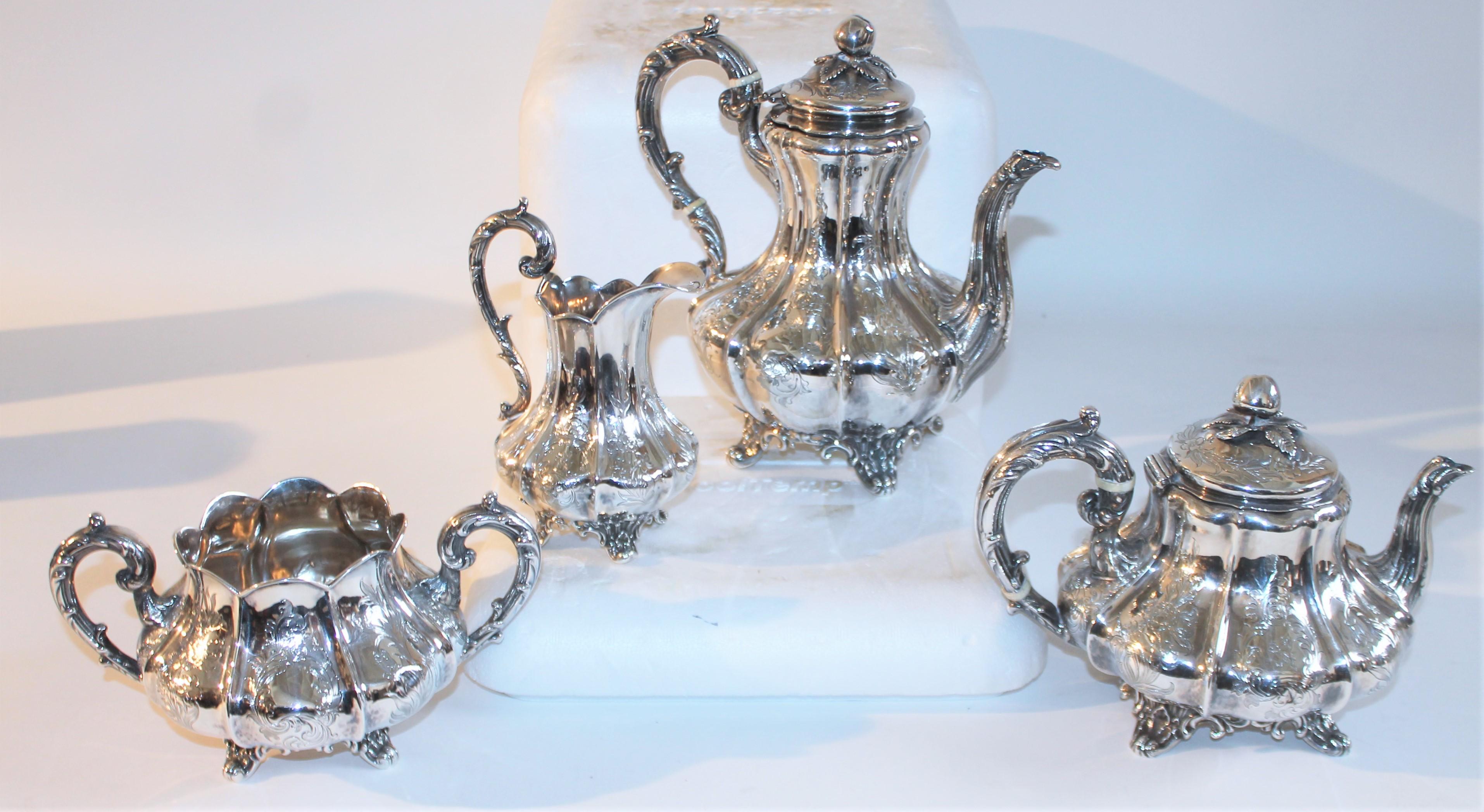 19th C hand crafted sterling four piece tea set (all hallmarked and photographed.) 

Measurements are as follows -
 
Double handle sugar bowl - 8.5 deep x 6 wide x 4.5 high

Creamer - 5 deep x 4 wide x 6.5 high

Short lidded tea pot - 9.5