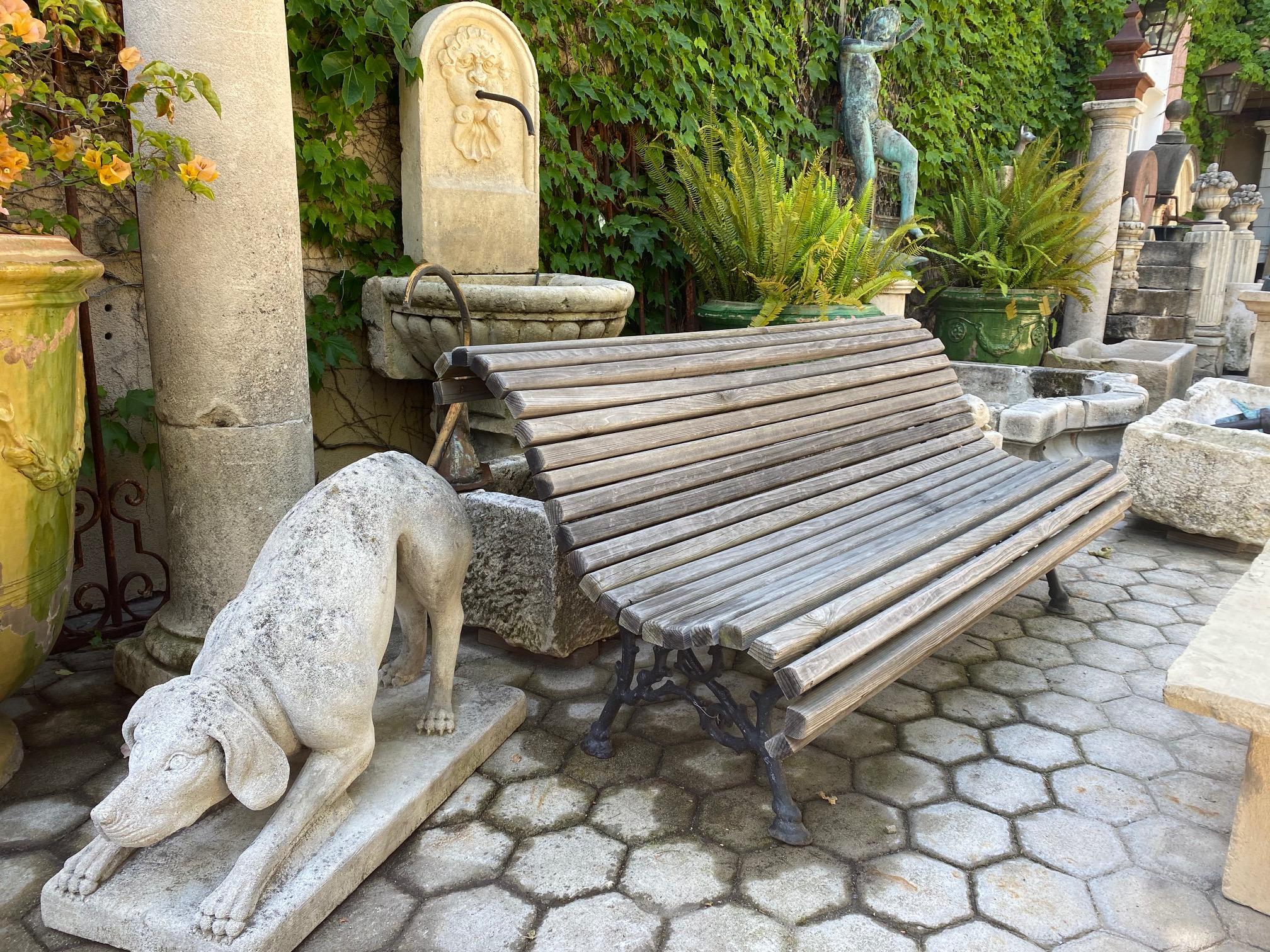 19th century hand forged metal and redwood Slats Garden bench. This rustic beauty is a rare piece indeed A beautiful garden bench simple lines that works in an interior as a seating or decorative architectural focal point element. Placed in the