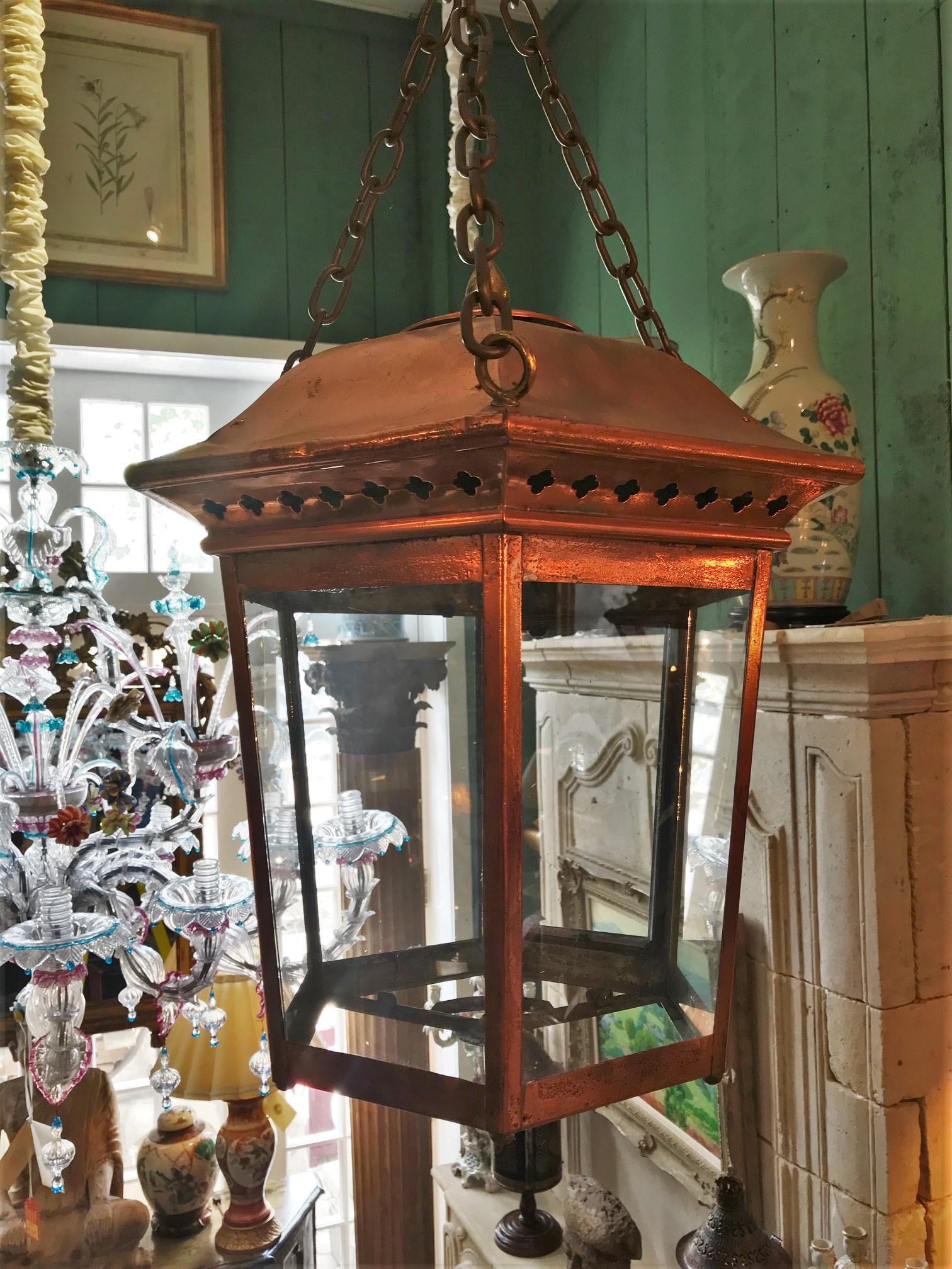 19th century Louis Philippe style Carriage Hexagonal copper ceiling lantern with brass elements.
This charming 19th century Classic copper lantern features a tiered decoration at the top, on all corners small ball feet on the bottom corners. La