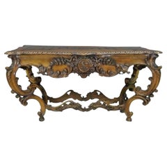 A.I.C., table centrale en noyer sculpté de style Louis XV, 19ème siècle.