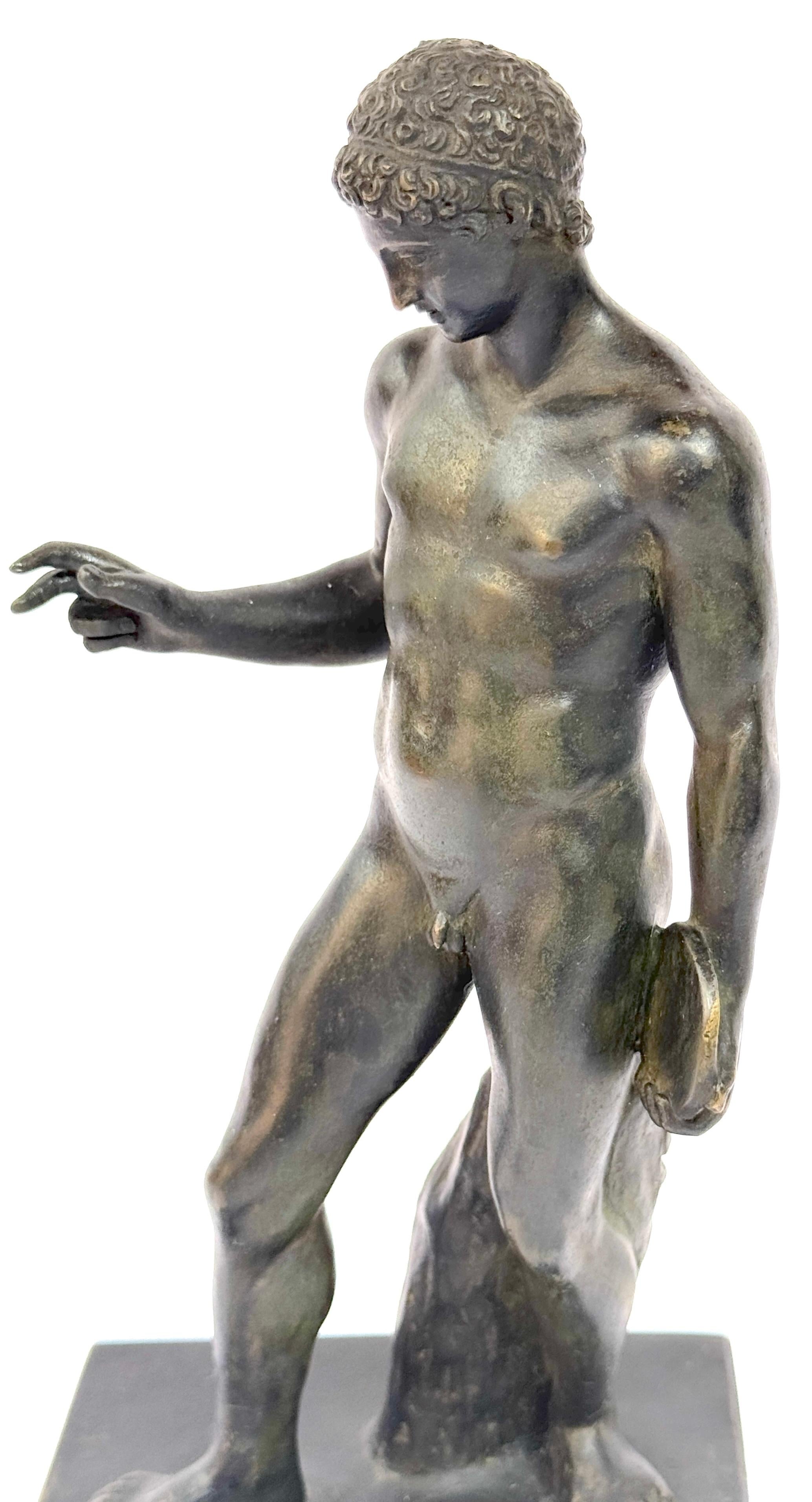 19th C. Italian Bronze Grand Tour Sculpture Nude Discuss Athlete, in Repose 

Attributed to the Naples Foundry, mid-19th century or older casting 

A 19th-century Italian Grand Tour bronze sculpture of a nude discus athlete in repose, attributed to