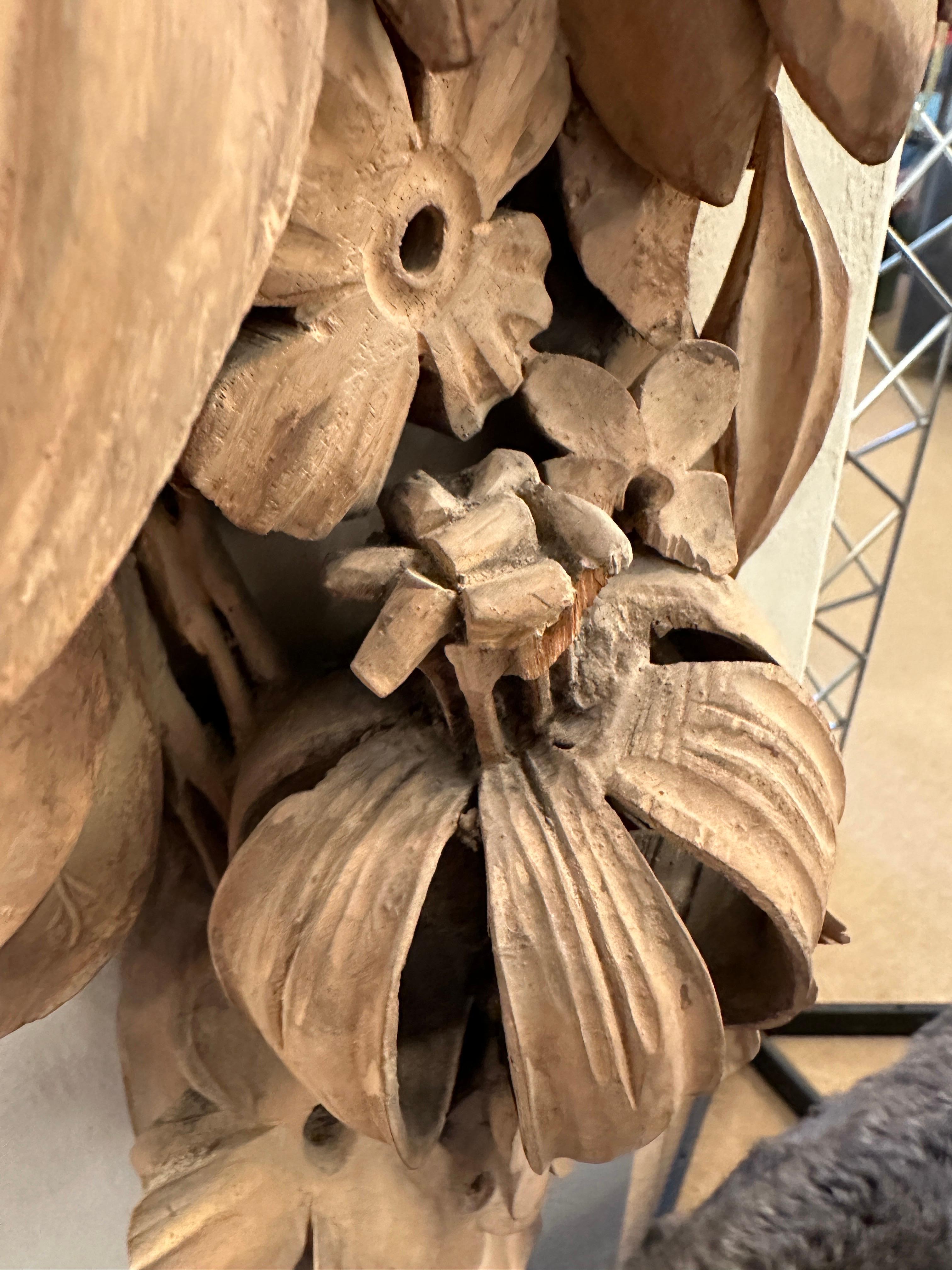 This amazing architectural remnant from a Venetian palace is mounted on a painted board for wall hanging.  The intricately carved wood in to a floral and fruit arrangement is truly magnificent.  Details abound!

NOTE:  due to its delicate nature, we