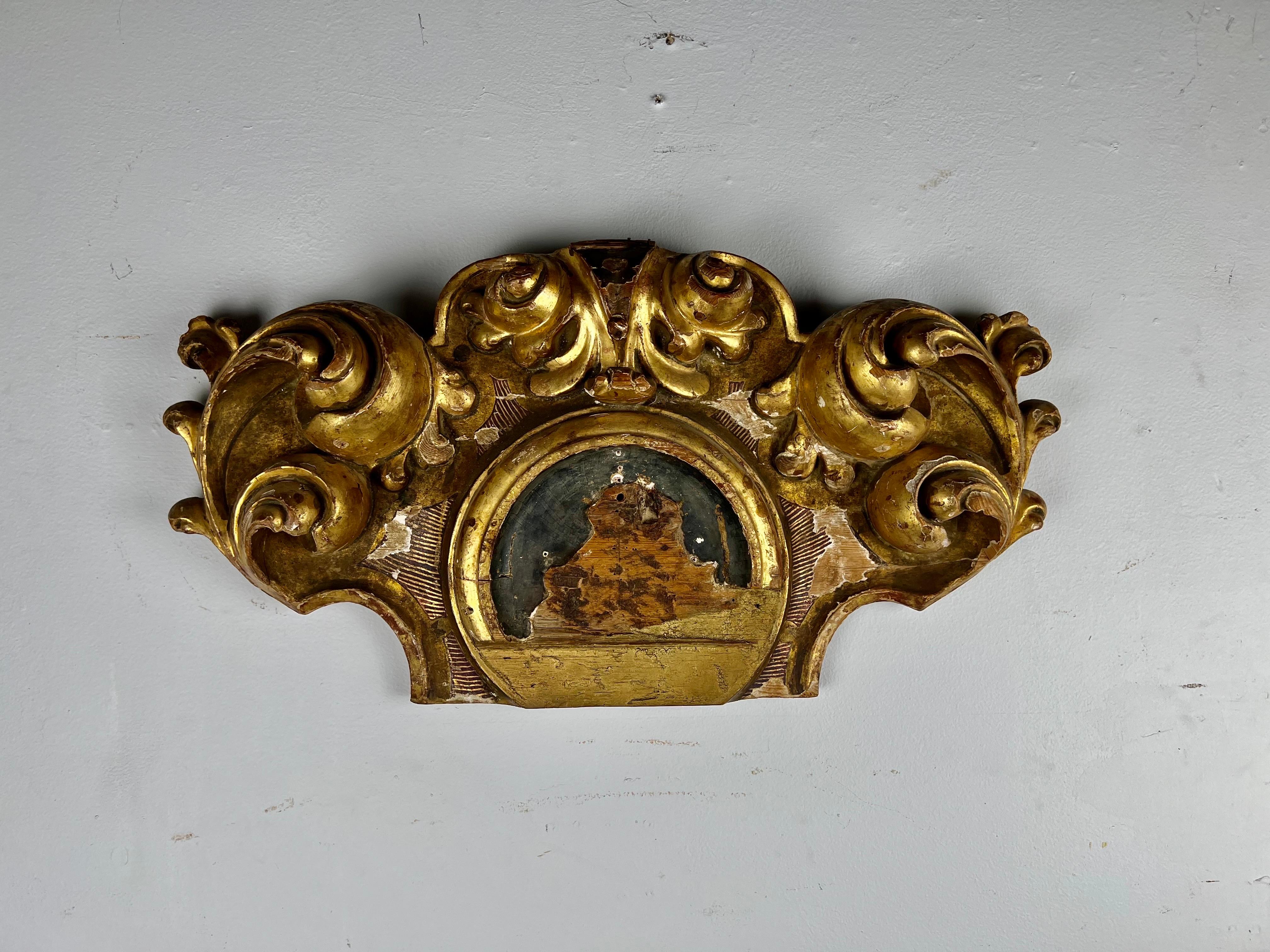 19th Century heavily carved giltwood fragment depicting swirling acanthus leaves throughout.