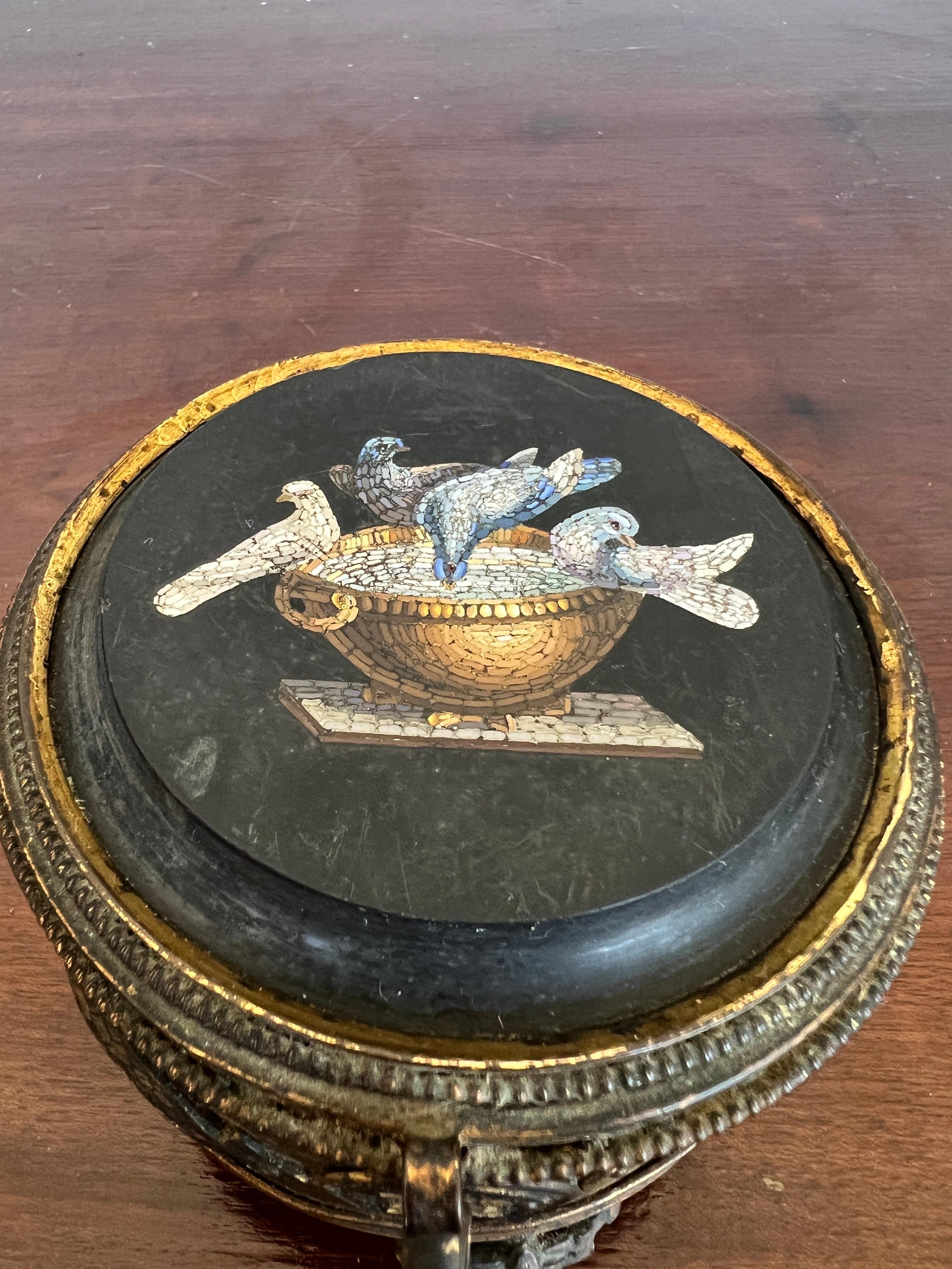 Italian, likely Circa 1880.

This beautiful box has an exceptional Grand Tour Micro-mosaic plaque depicting the Capitoline Doves or Doves of Pliny after the Roman antiquity. Also by legendary maker Giacomo Raffaelli. 

