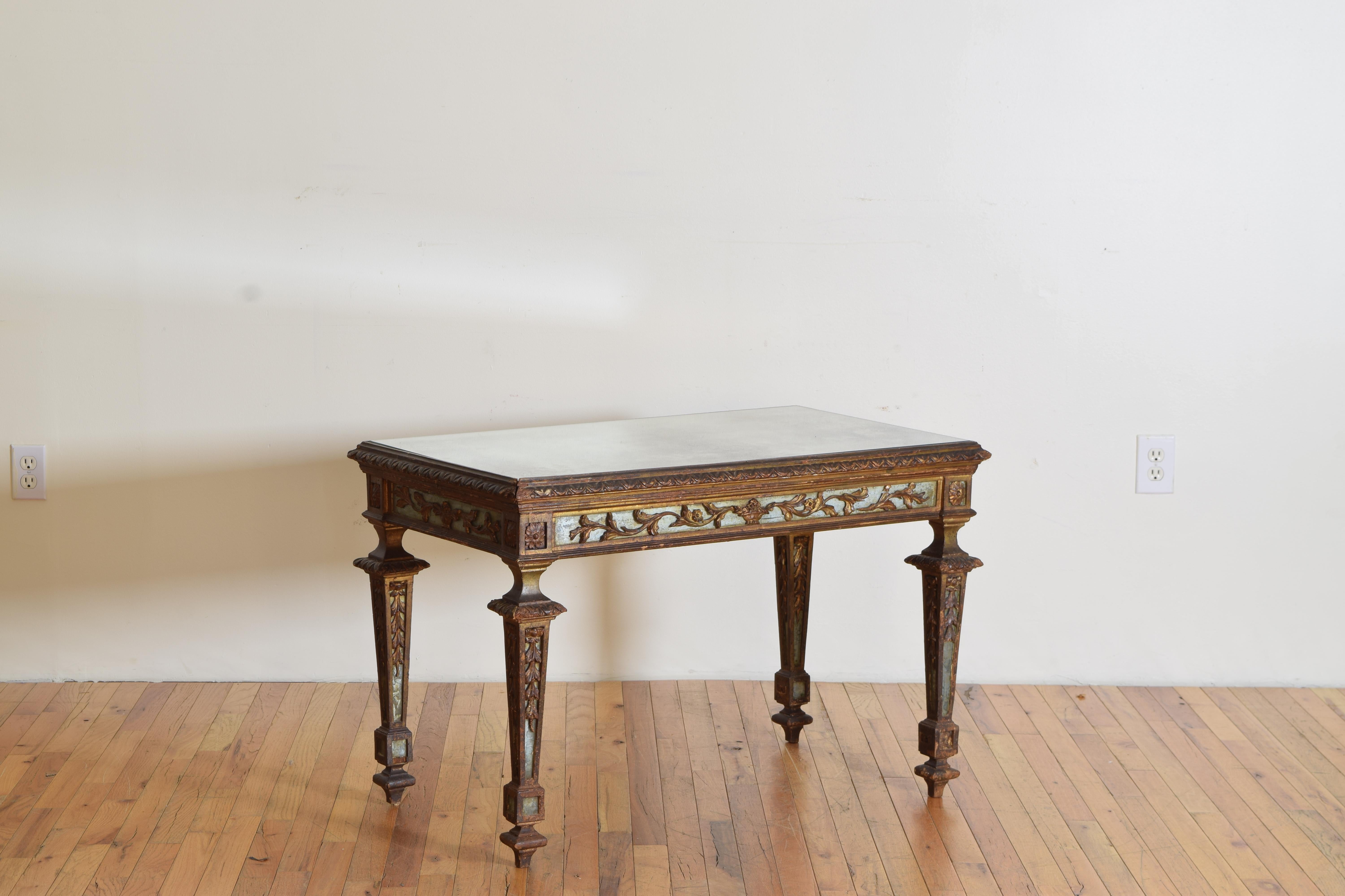 Italian hand-carved gilded and Painted with inset mirrored glass and a newly antiqued mirrored glass top.