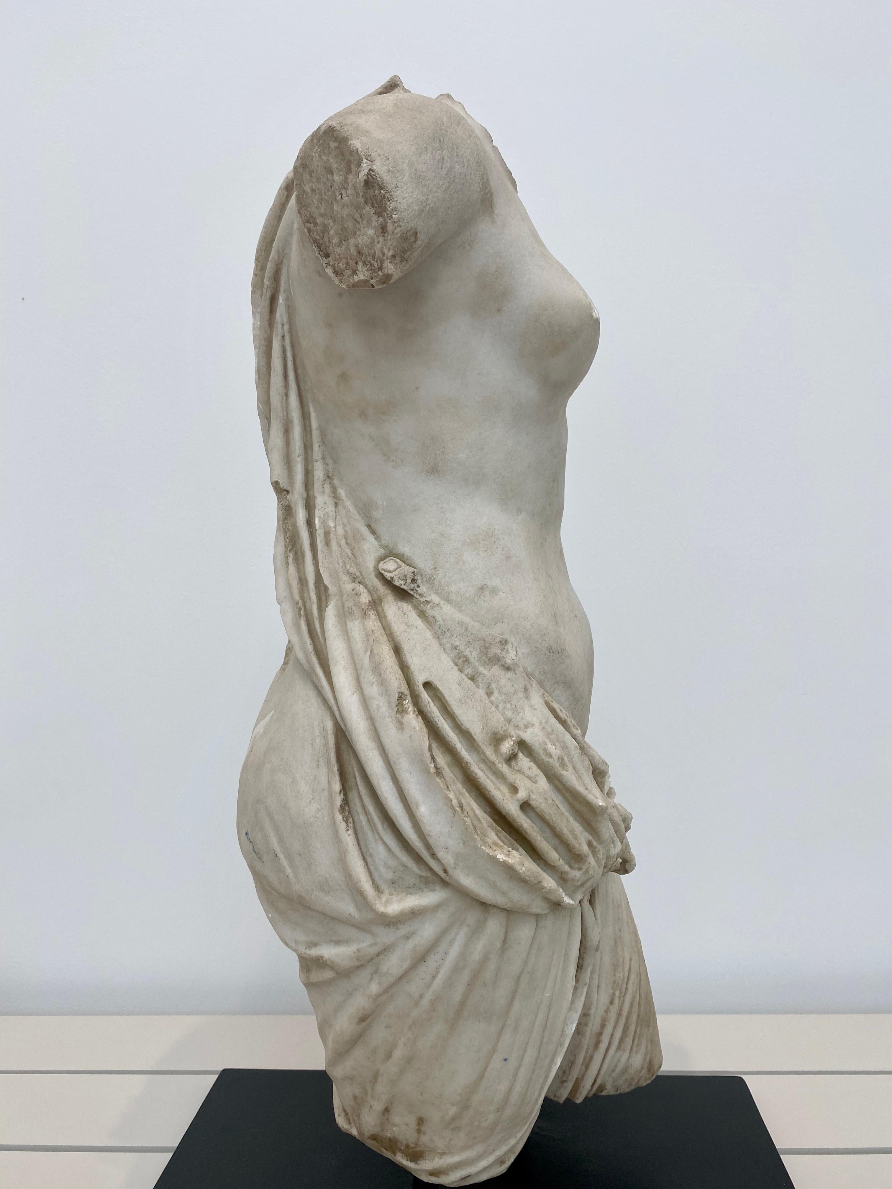 marble female torso sculpture