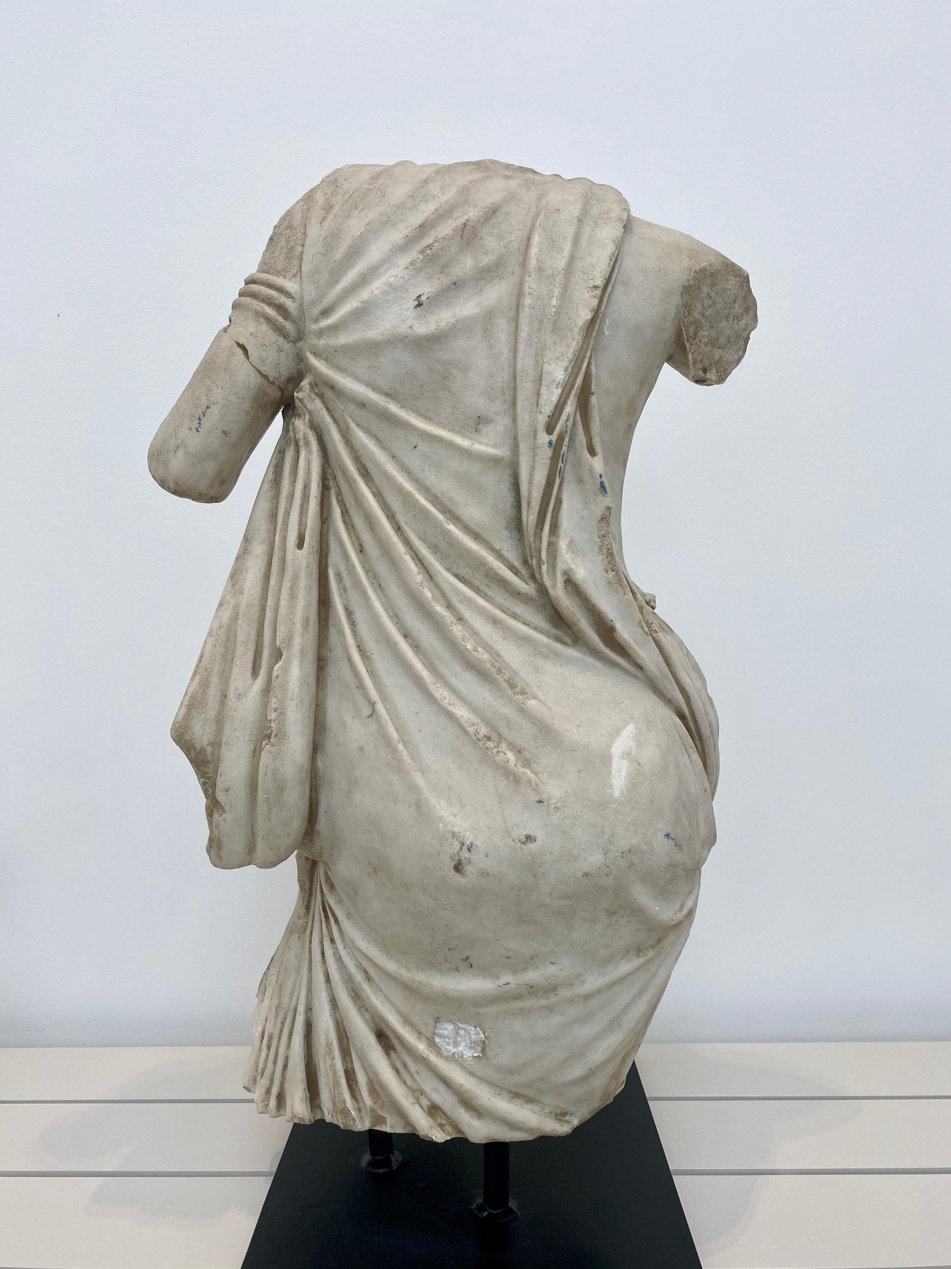 female torso statue