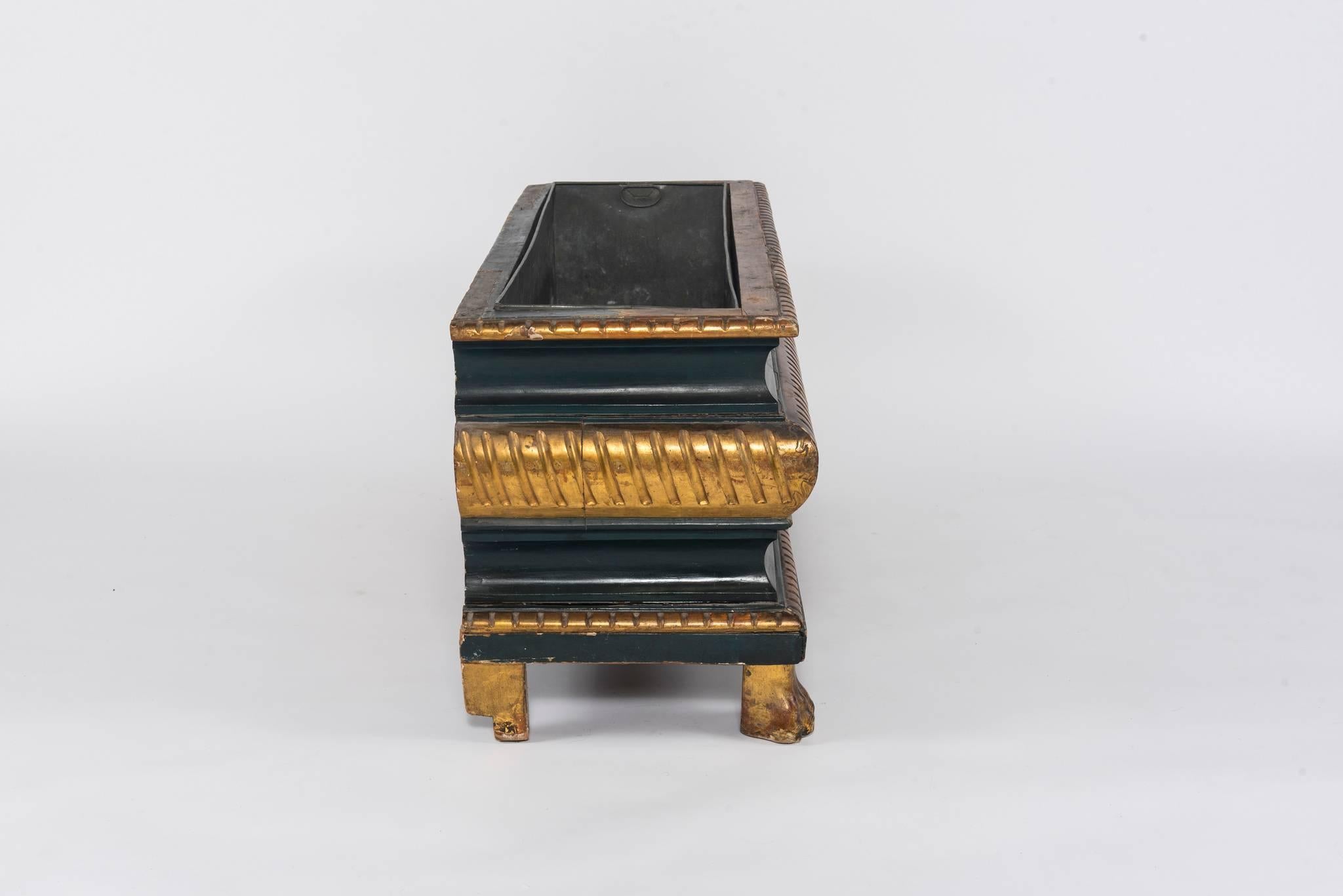 19th century Italian painted and giltwood jardinière with lion's foot detailing and metal liner.