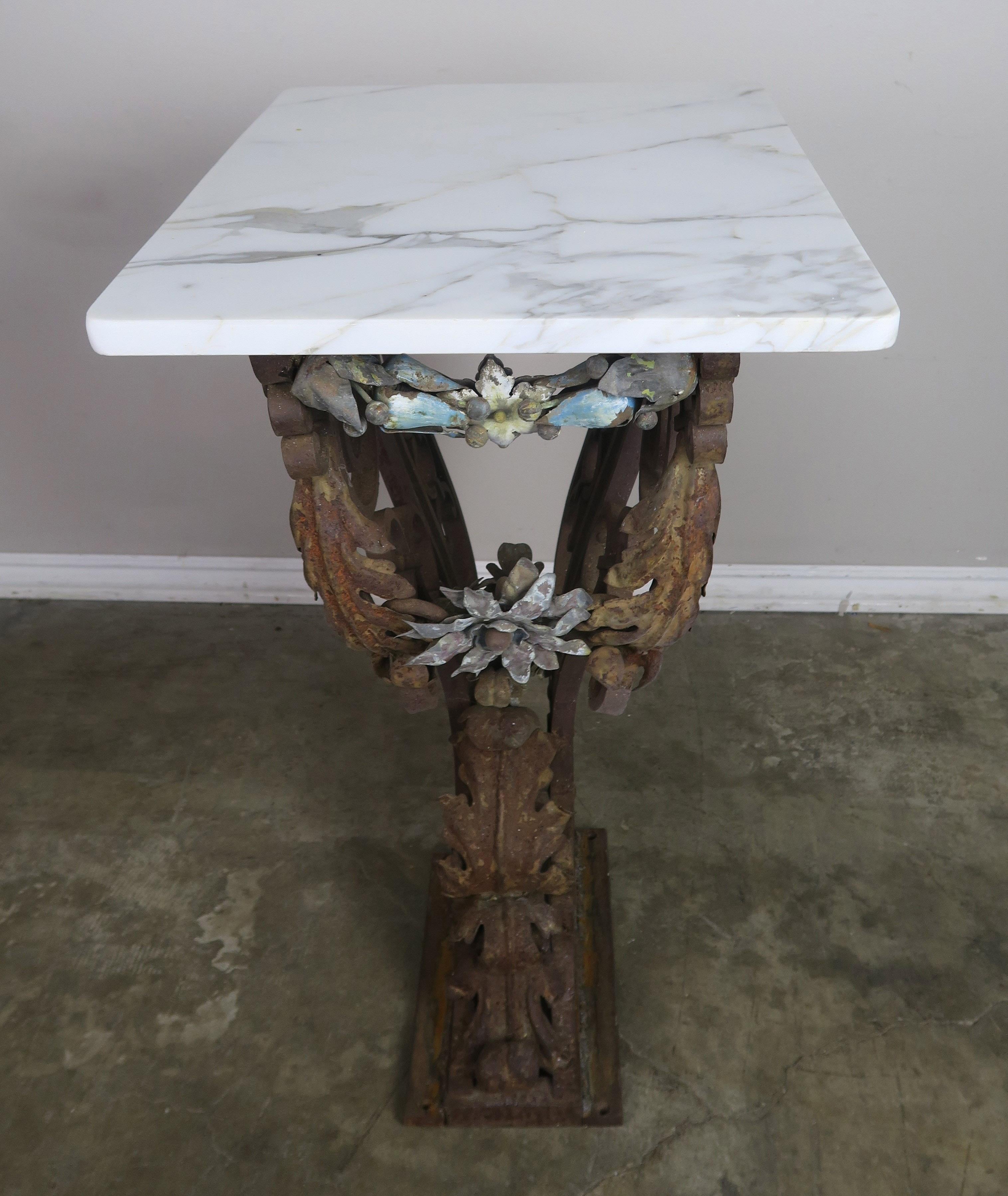 19th century Italian painted wrought iron table with Carrara marble top.