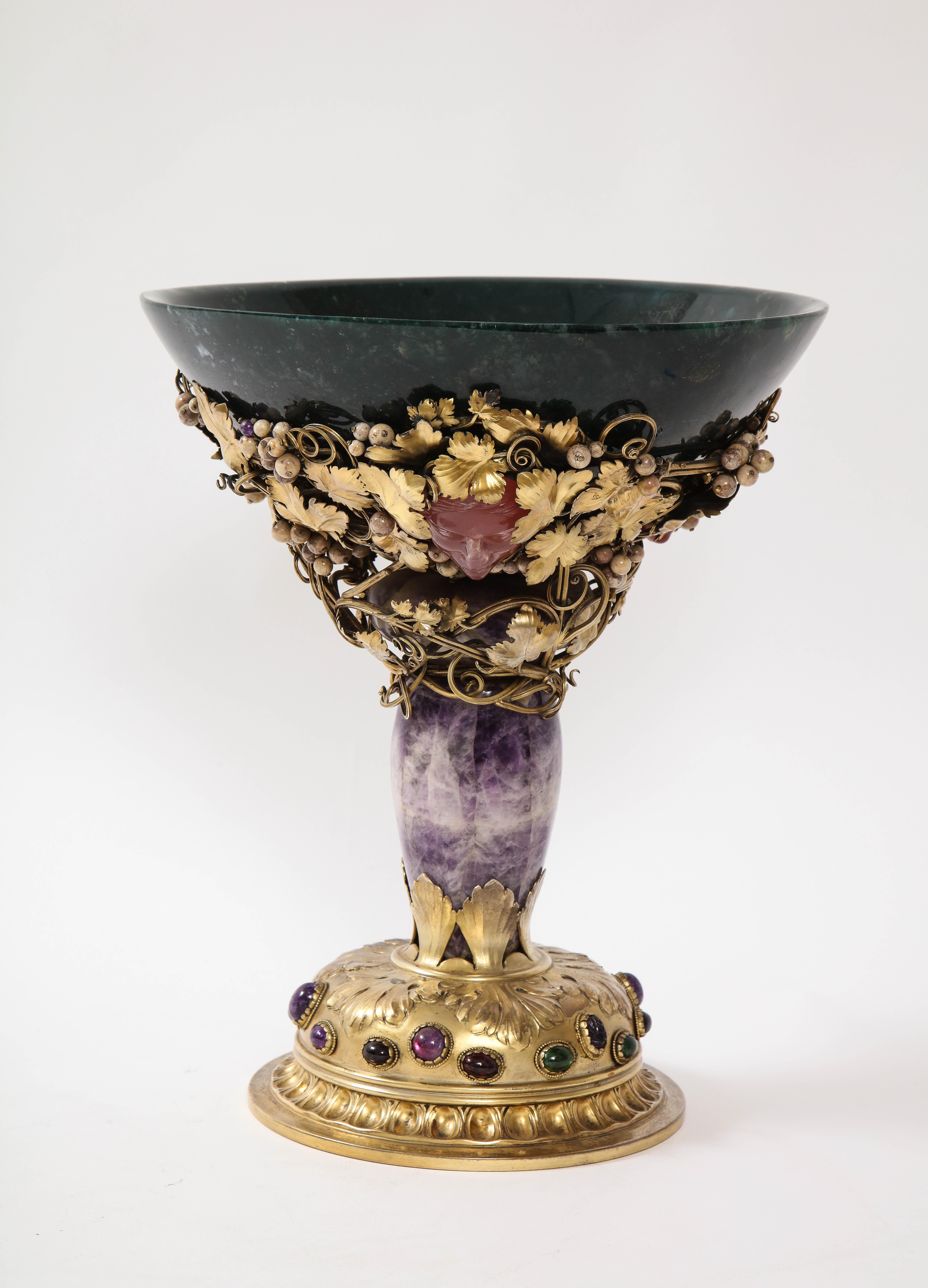 An important and unique 19th century Italian parcel-gilt silver mounted centerpiece consisting of multi semi-precious gem-stone including agate, Bloodstone Jasper, Amethyst, and others, attributed to Buccellati. This is truly a museum quality piece.