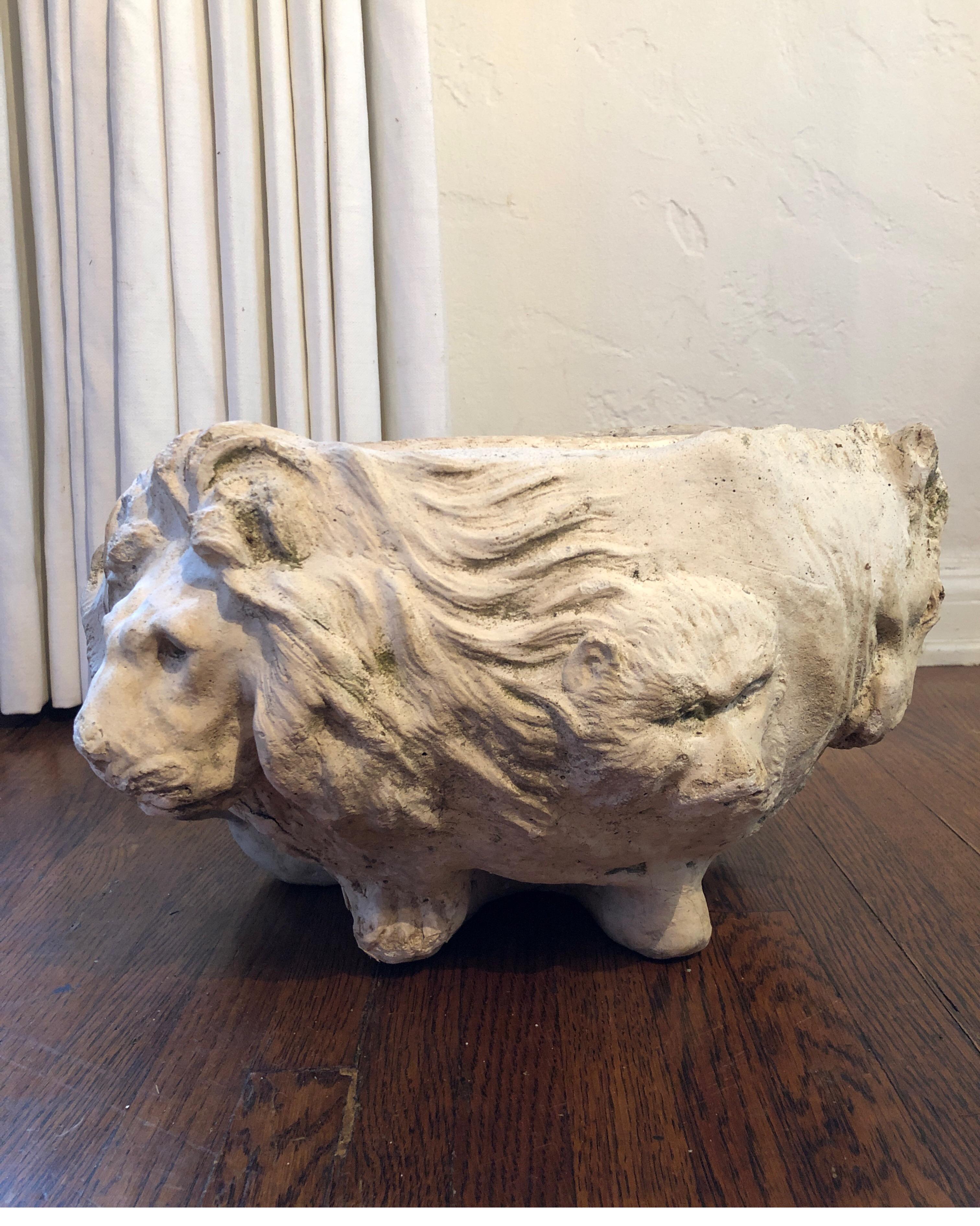 Unique carved stone planter with lion face as well as elephant, tiger and other animals. See pics.
Base has carved legs to raise it a bit off the ground, 19th century.

Wear consistent with age. See pics.