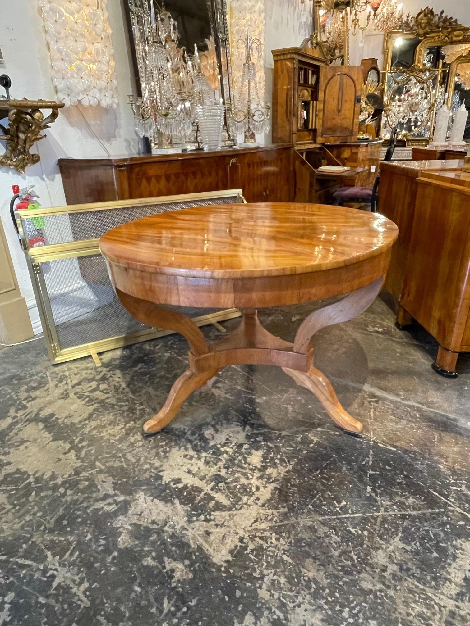 19th c. Italian walnut center table with French polish finish Circa 1860.  A timeless and classic center table, perfect for today's design.