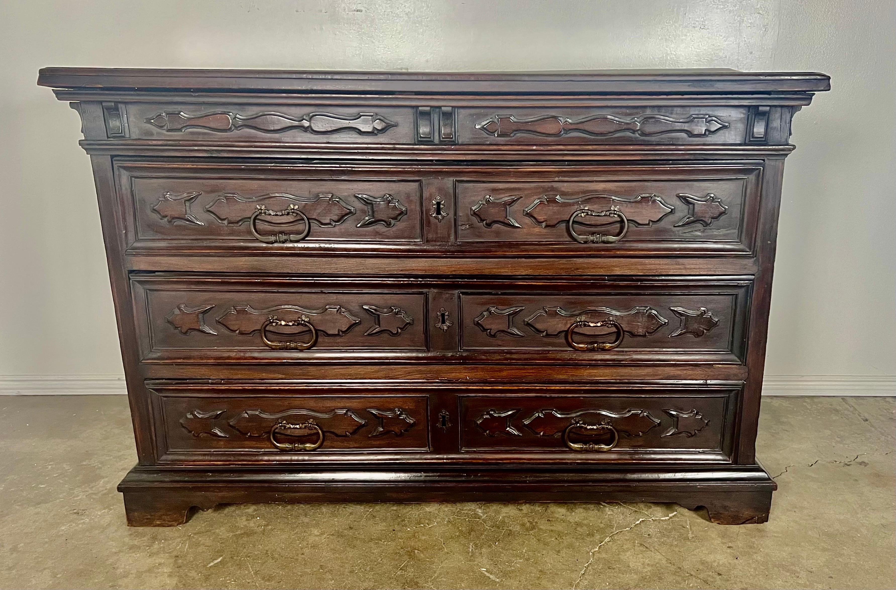 19th C. Italian walnut Renaissance style chest of drawers. There are eight drawers for plenty of storage. This handsome piece still has it's original hardware.