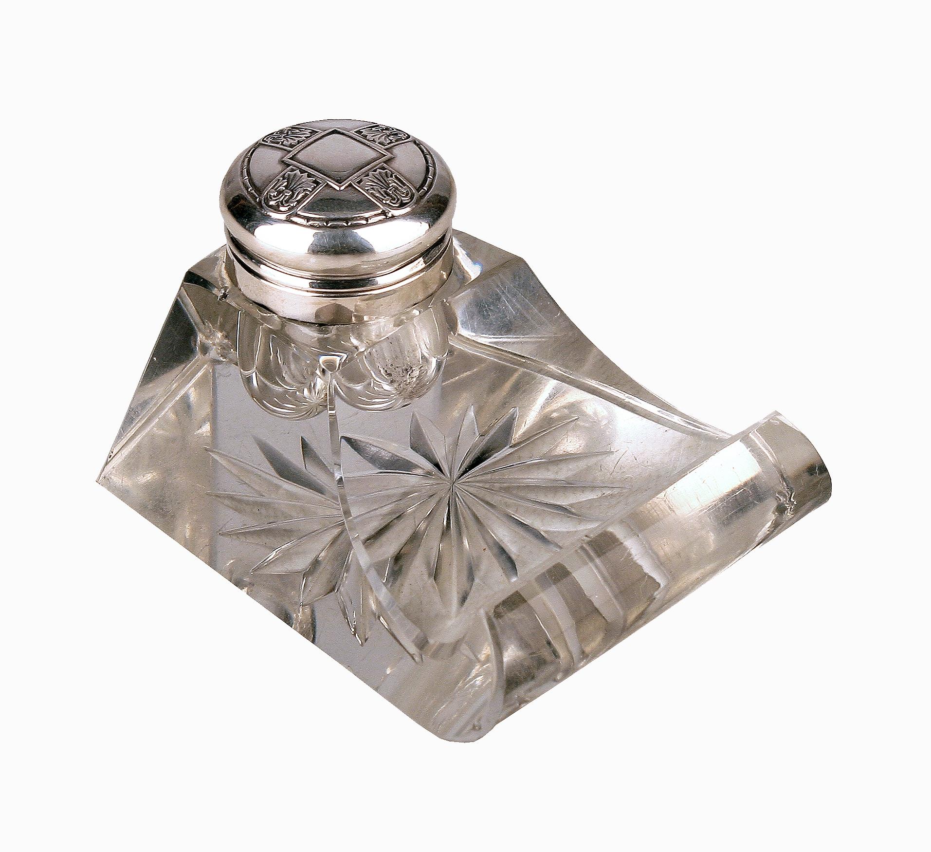 Late 19th century Jugendstil german cut glass crystal inkwell with polished 800 silver lid

By: unknown
Material: glass, cut glass, crystal, silver, silver plate, metal
Technique: cast, molded, metalwork, plated, silvered, polished,