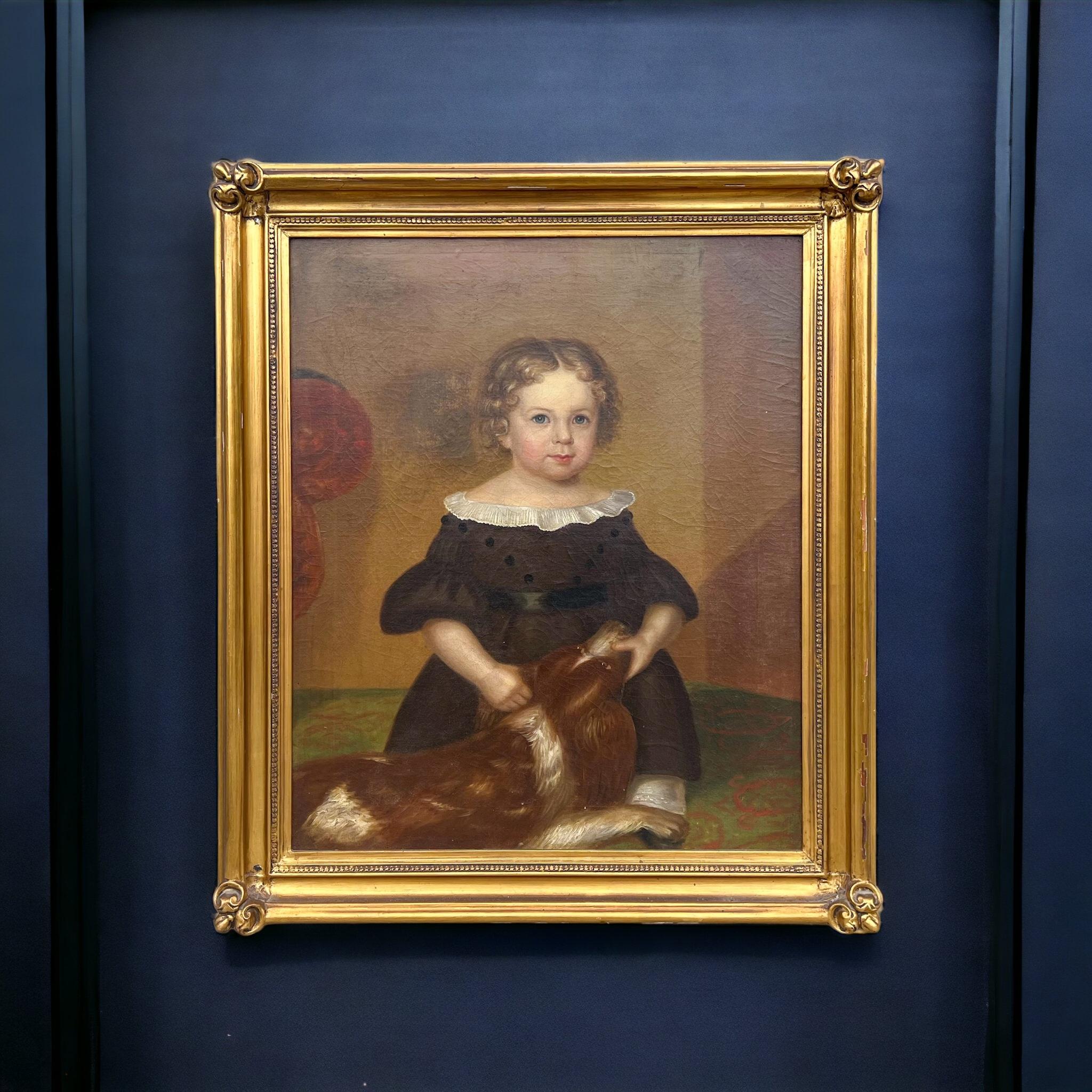 This is a large scale 19th century folk art painting of a child with a spaniel day. It is unsigned and in very good condition. It is most likely to be American.