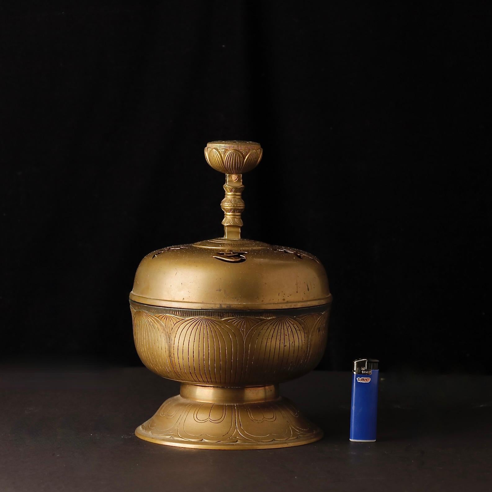 An extraordinary Buddhist temple incense burner from Japan, dating to the late Edo period (18th–19th century). Finely cast in bronze, this ceremonial piece features intricate openwork decorations in the shape of Sanskrit seed syllables (bīja)—sacred