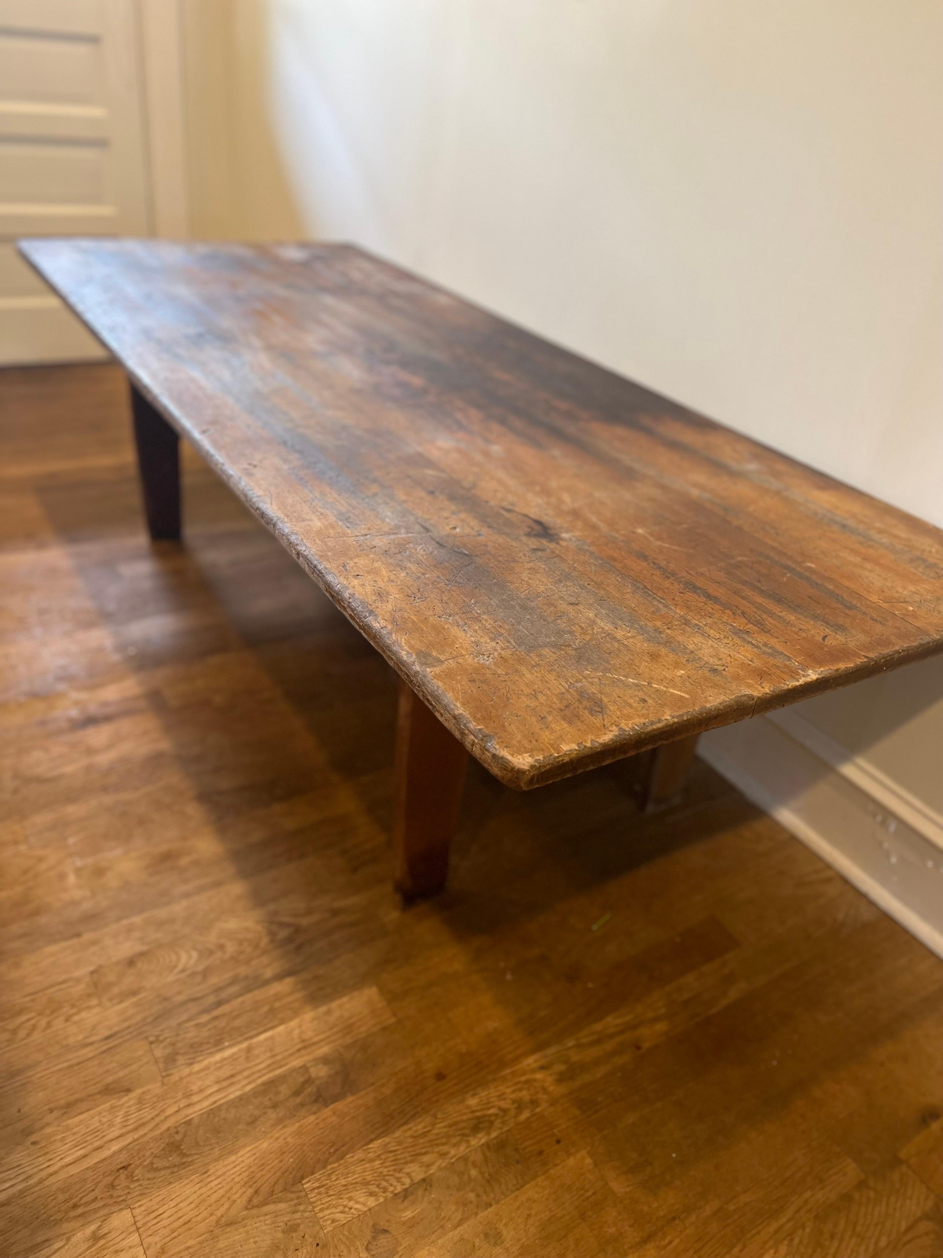 19th C. Large Rustic American Pine Low Trestle Coffee/Cocktail Table In Distressed Condition For Sale In Los Angeles, CA