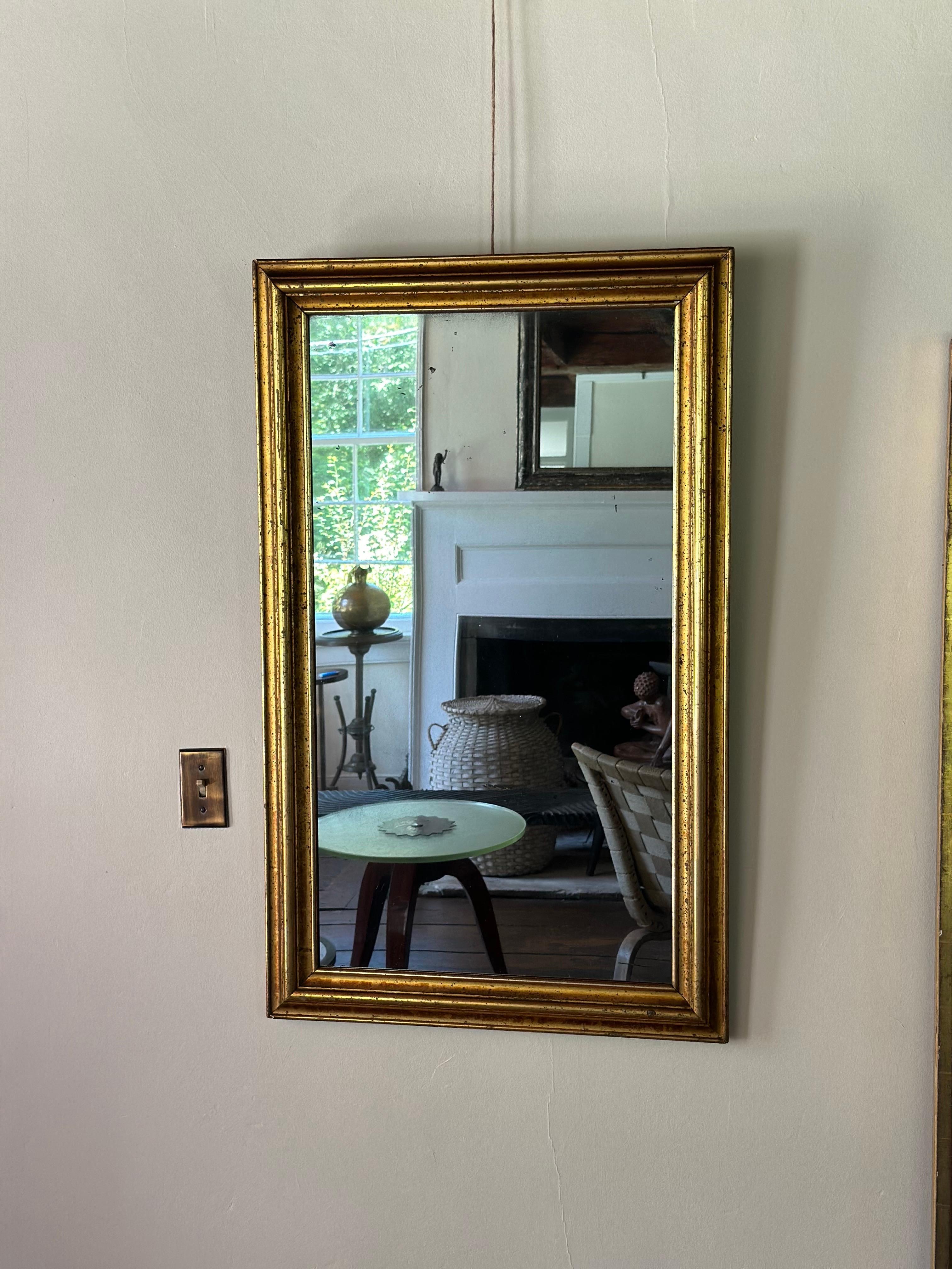 North American 19th C. Lemon gilt framed mirror