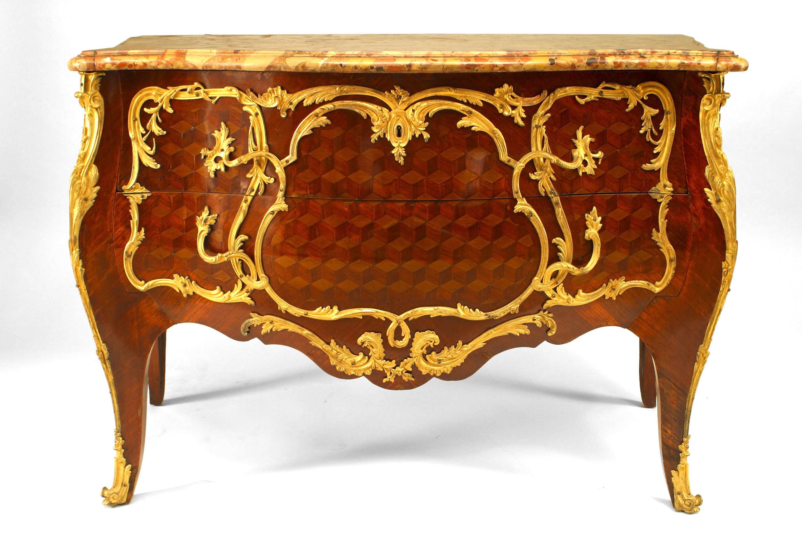 French Louis XV style (19th Century) inlaid parquetry 2 drawer commode with bronze trim and shaped marble top.
