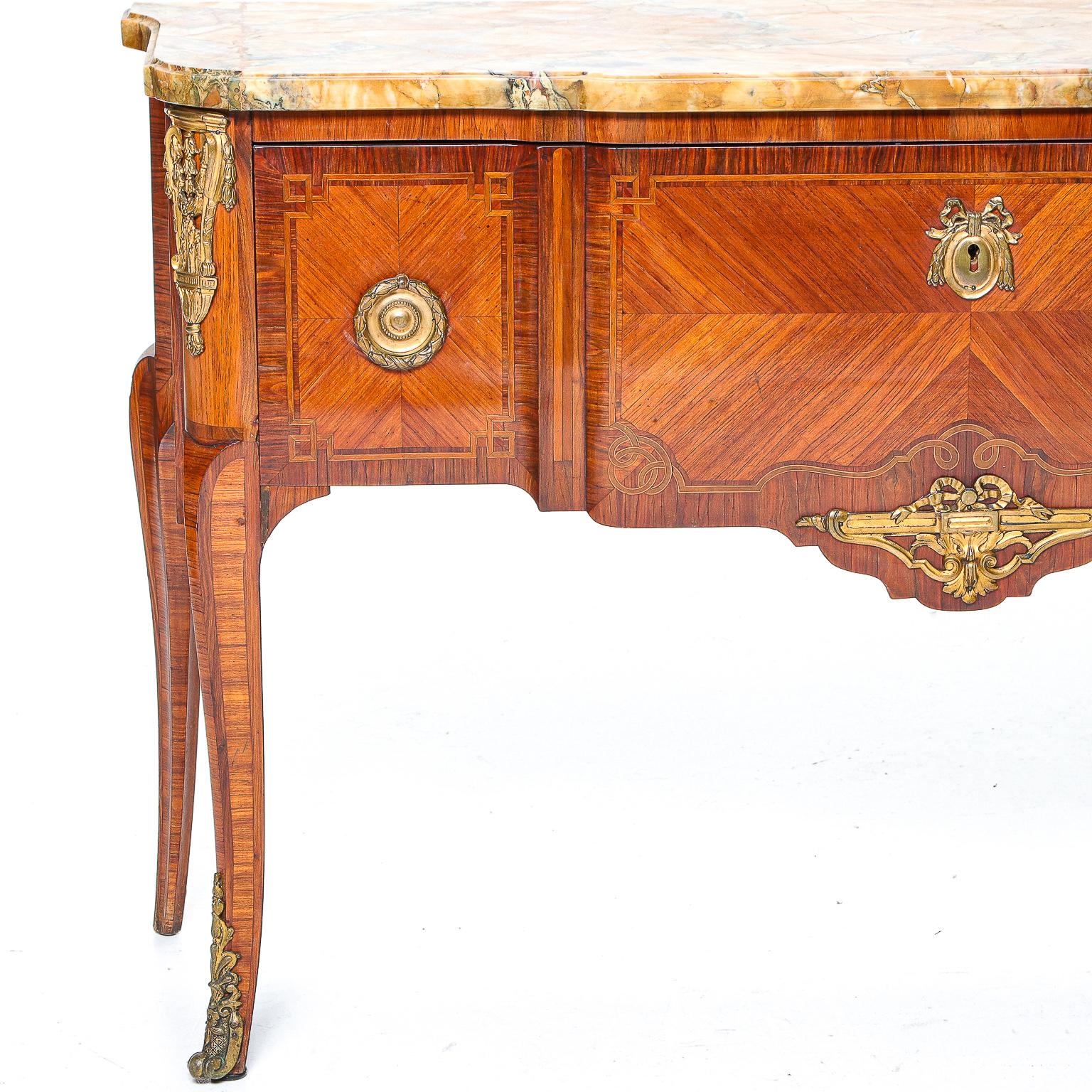 19th C. Louis XVI style marble top commode Servante with Kingwood and Tulipwood Banding, Olive Wood String Inlays in Scroll Formations, Corners Adorned with Rounded Bronze Ormolu Mounts Leading to a Tapered Inlaid Leg with Ormolu Sabot Feet,