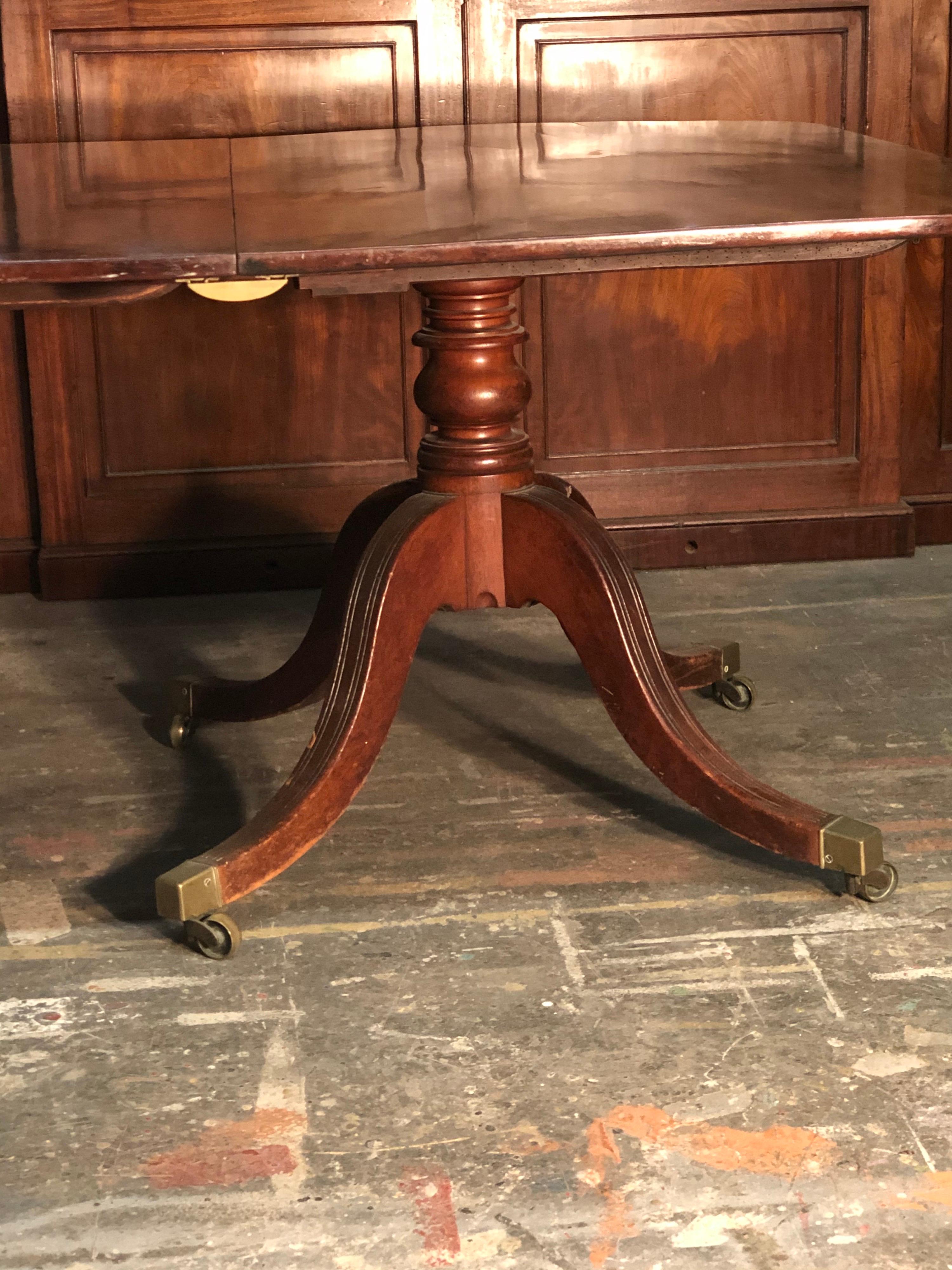 19th C. Mahogany Double Pedestal English Regency Dining Table with Brass Casters 1