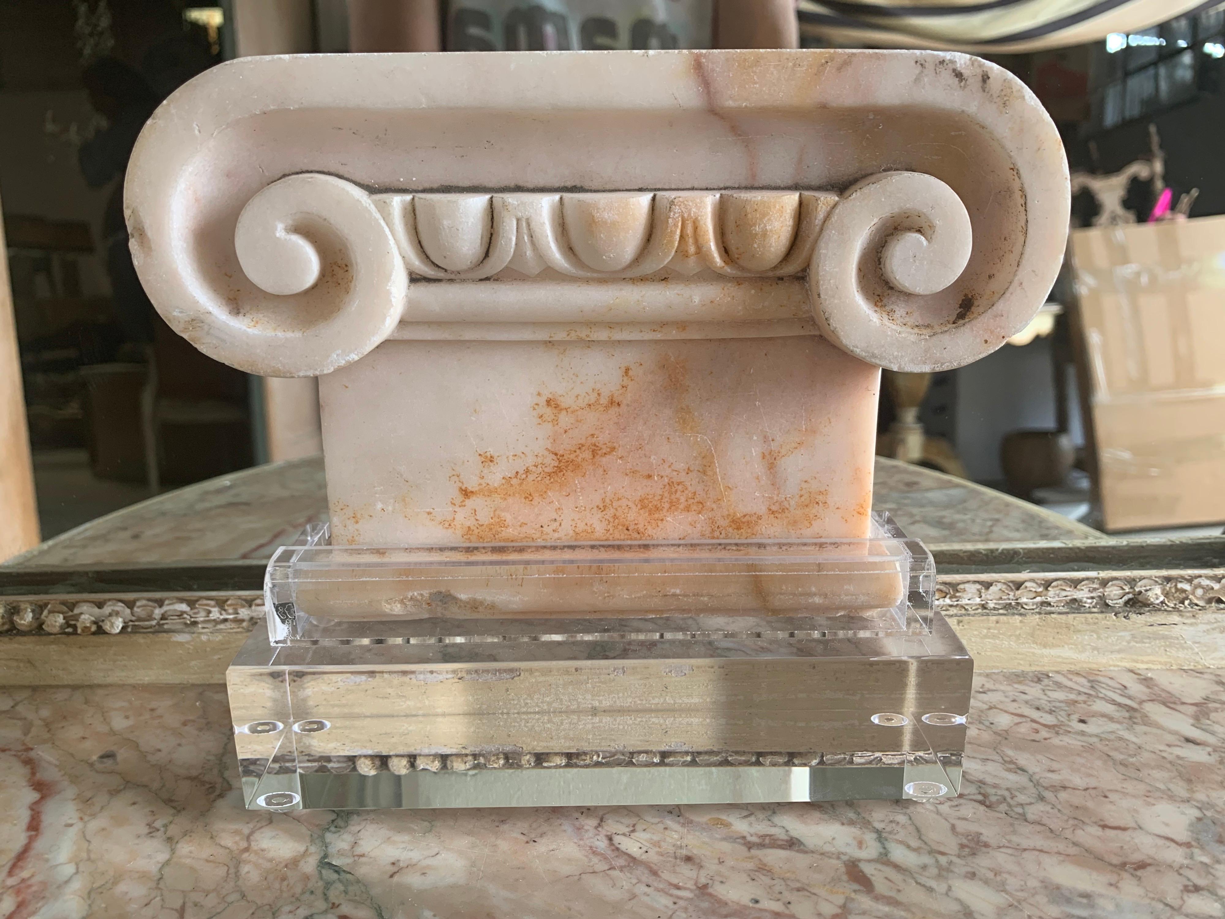 19th century carved marble capital on Lucite base. I purchased the Capital in Italy but it was made in France.