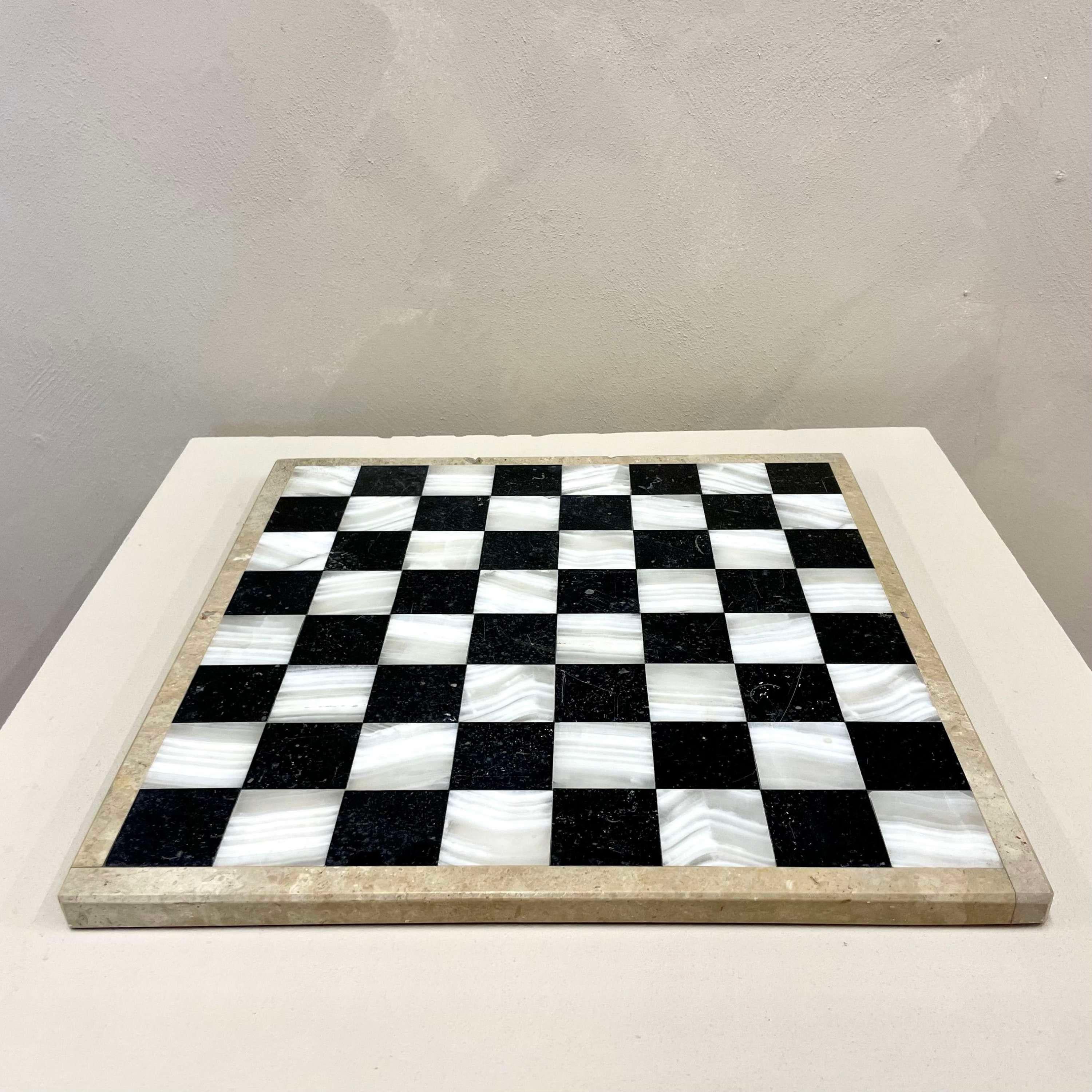 English 19th marble and mother of pearl chess board.
This would make a great focal piece on a footstool with decorative items placed on it 

35.5 cm x 35.5 cm
Height 1.5 cm
We are happy to work with you with your choice of shipping 
or we can