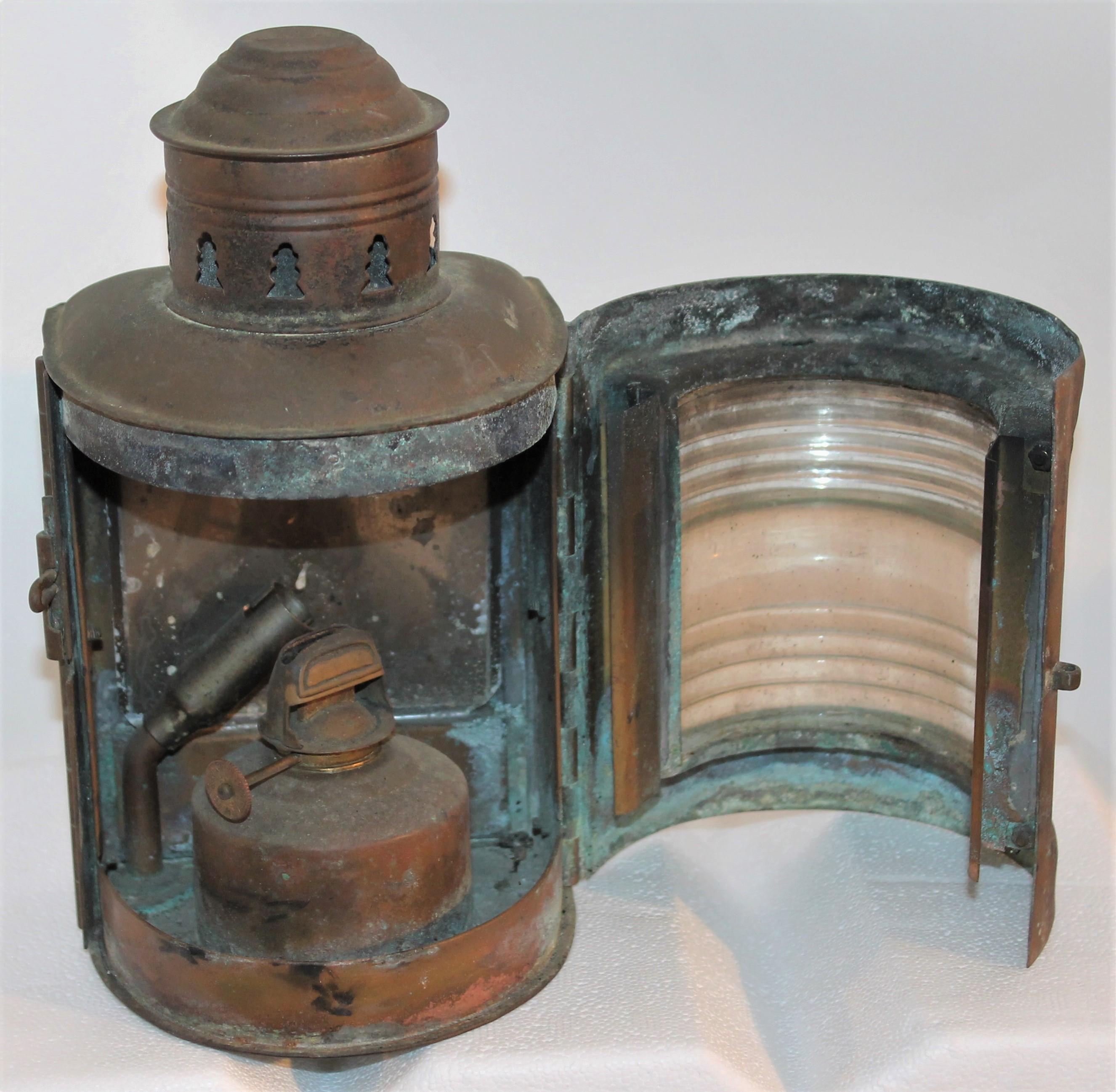 This working lantern is in a patinaed copper and in very good condition. Great nautical look in your beach house or bathroom. It retains the original 19thc glass globe cover.
Hurricane Tested
Marine Lights
Wilcox Crittenden & Co. Inc
Middleton