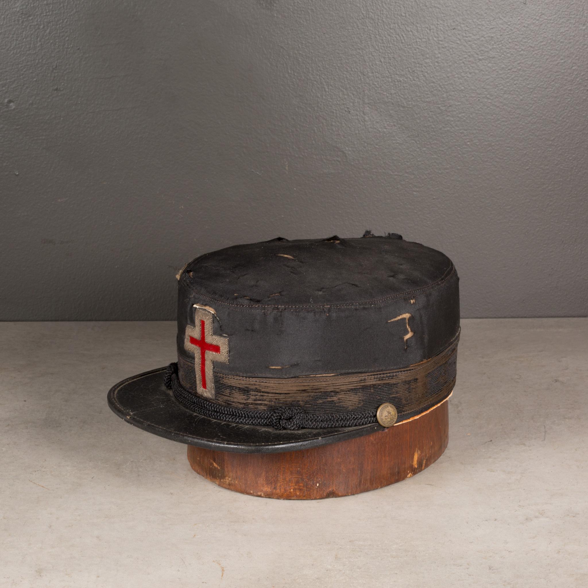 About

An original Masonic Knights Templar hat with silver and red cross. The leather brim is trimmed with rope and brass buttons. Hat block not included.

 Creator The McLilley & Co., Columbus, Ohio. 
Date of manufacture c.1800s.
Materials and