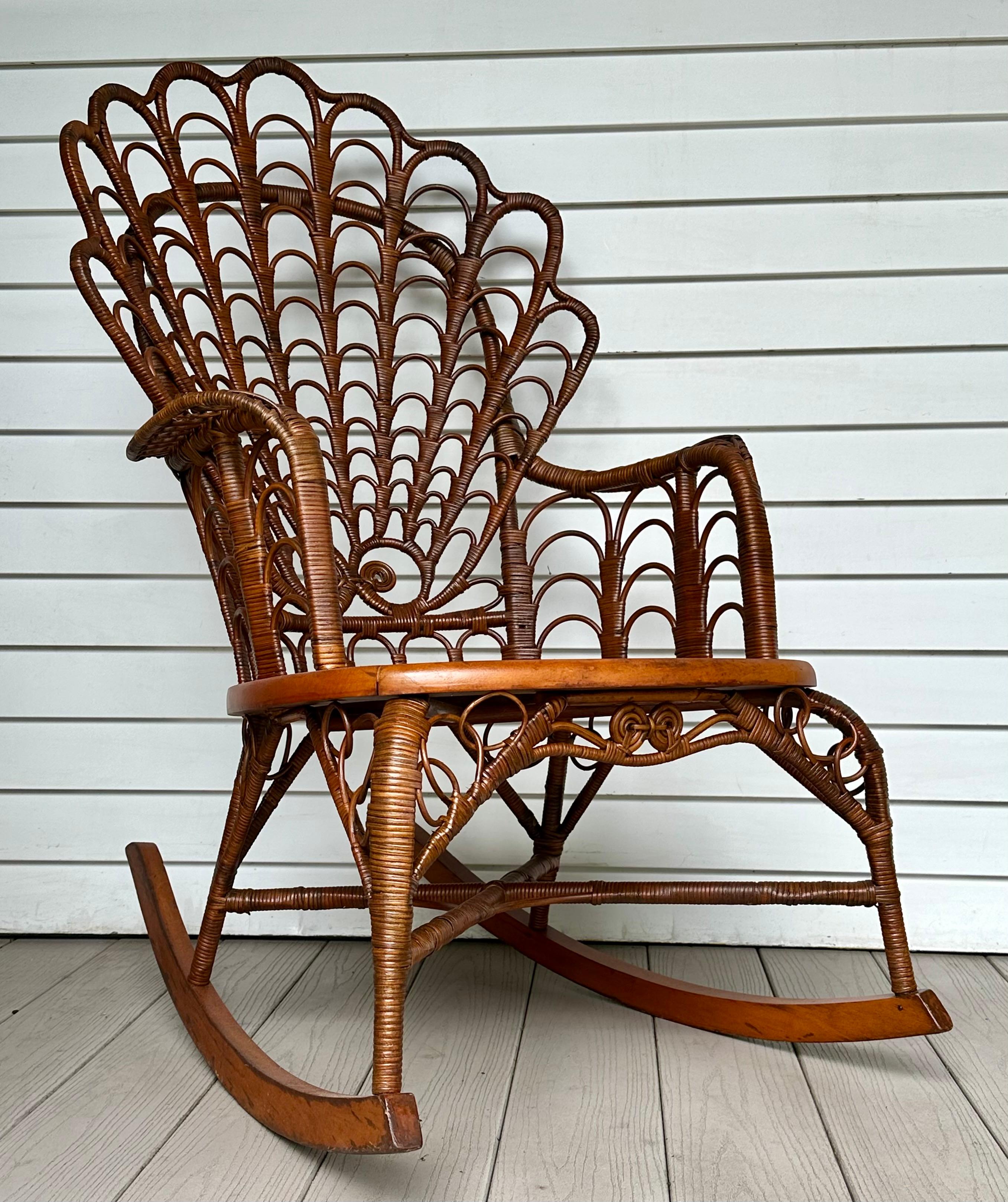 Wicker 19th C. matching wicker shell back design adult and child size rocking chairs For Sale