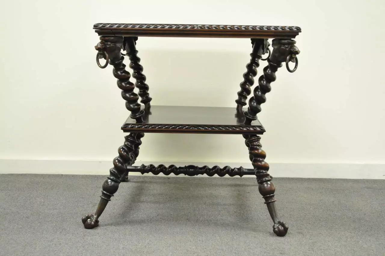 Beautiful Victorian solid mahogany parlor table with barley twist legs by the Merklen Brothers. The table has very attractive angled legs, barley twist stretchers, exquisite bronze lions heads at the corners and brass ball and claw feet. The brass