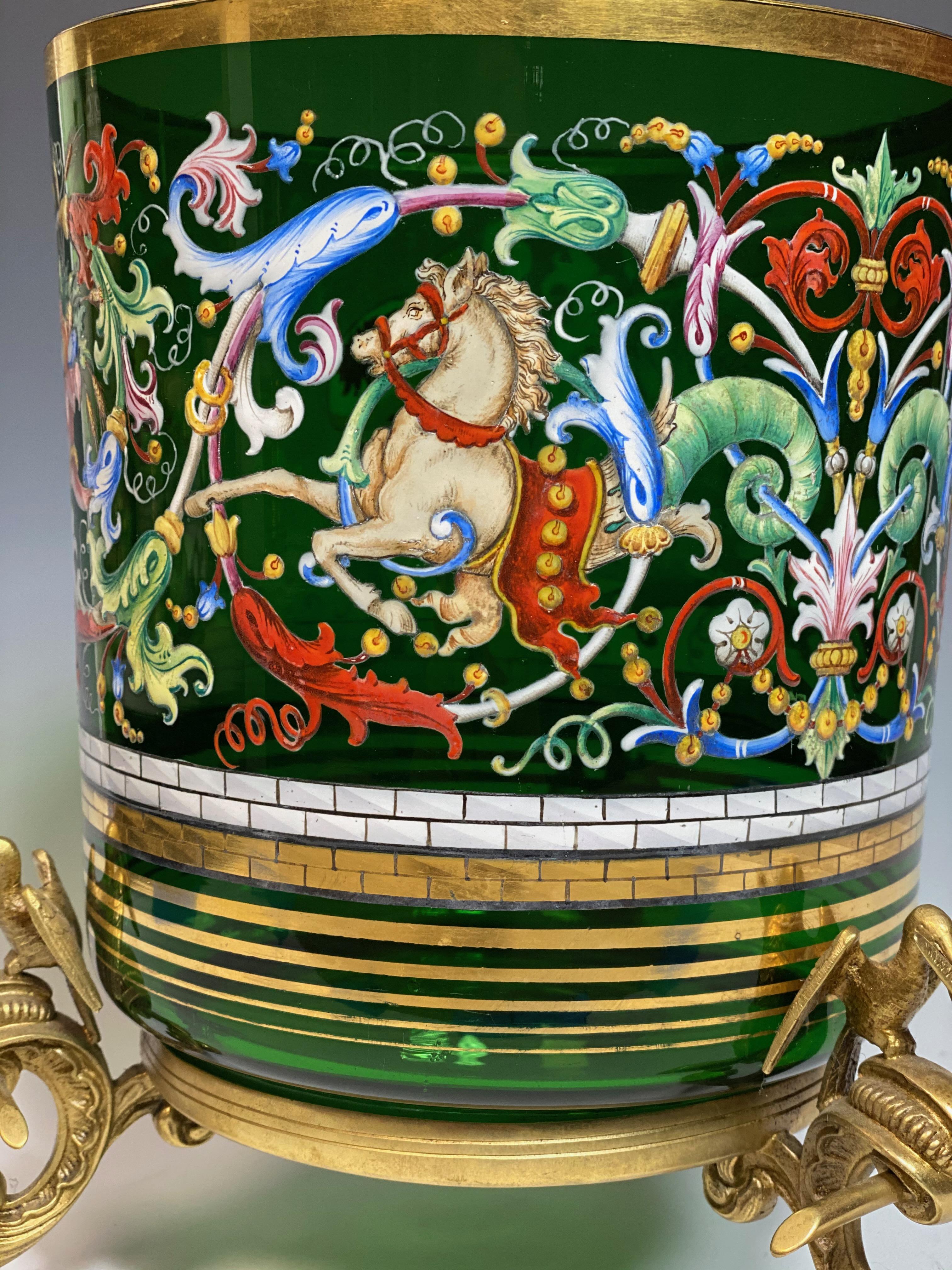 What an incredible work of art! The hand blown apple green crystal vase is completely hand painted with polychrome enamels surrounding the entire body. The subject is detailed and exhibits professional artistry depicting an historical battle scene