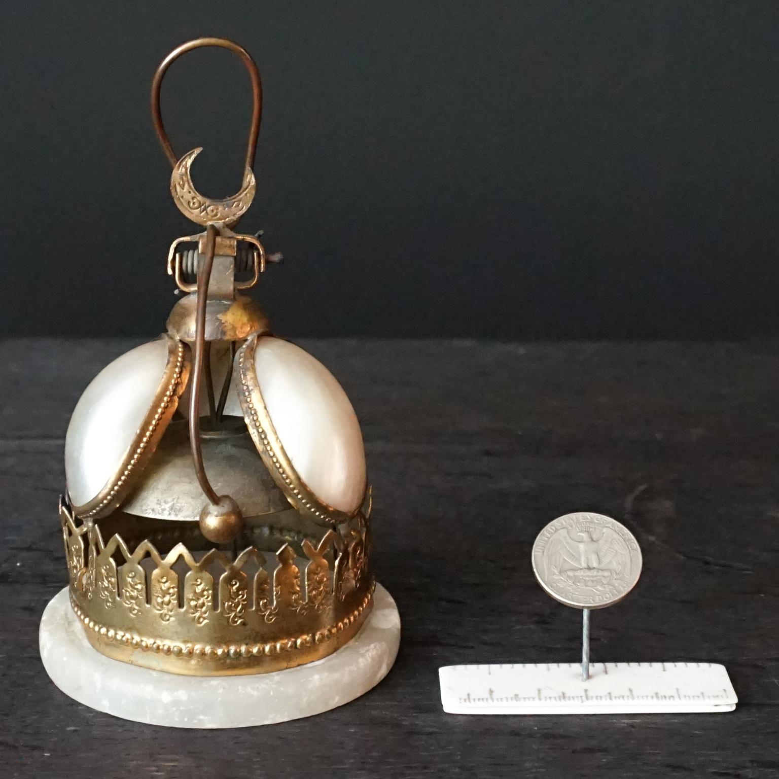 Fancy little antique 19th century Napoleon III french mother of pearl shell MOP, alabaster and ormolu or gilt brass hotel reception desk or servant tap call table bell. 
Brass wire handle with three mother of pearl shell panels on an alabaster