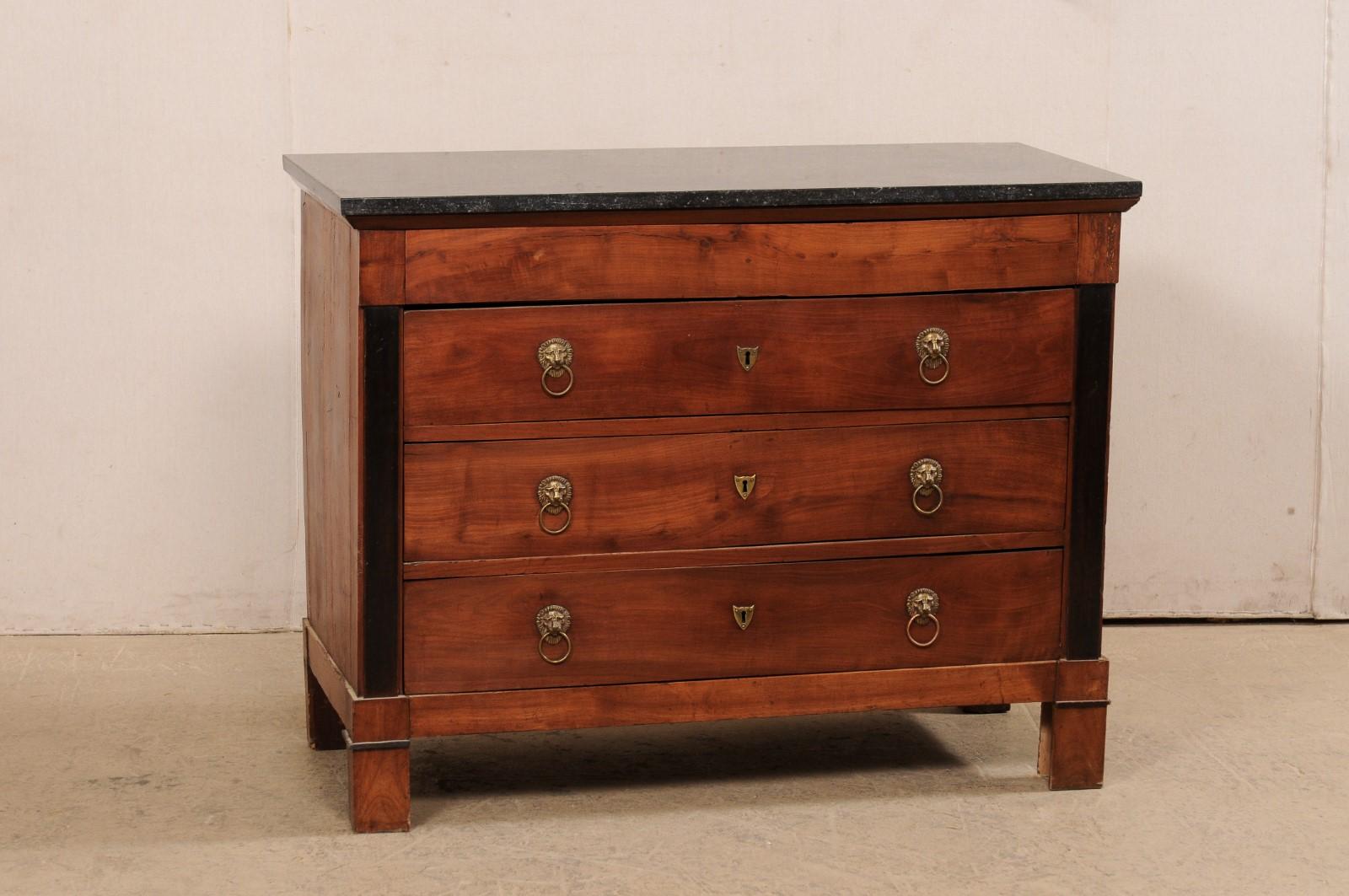 A French Neoclassical commode with four drawers and marble top from the 19th century. This antique chest from France features a rectangular-shaped marble top, over case which houses four drawers (upper drawer is disguised within the top frieze),
