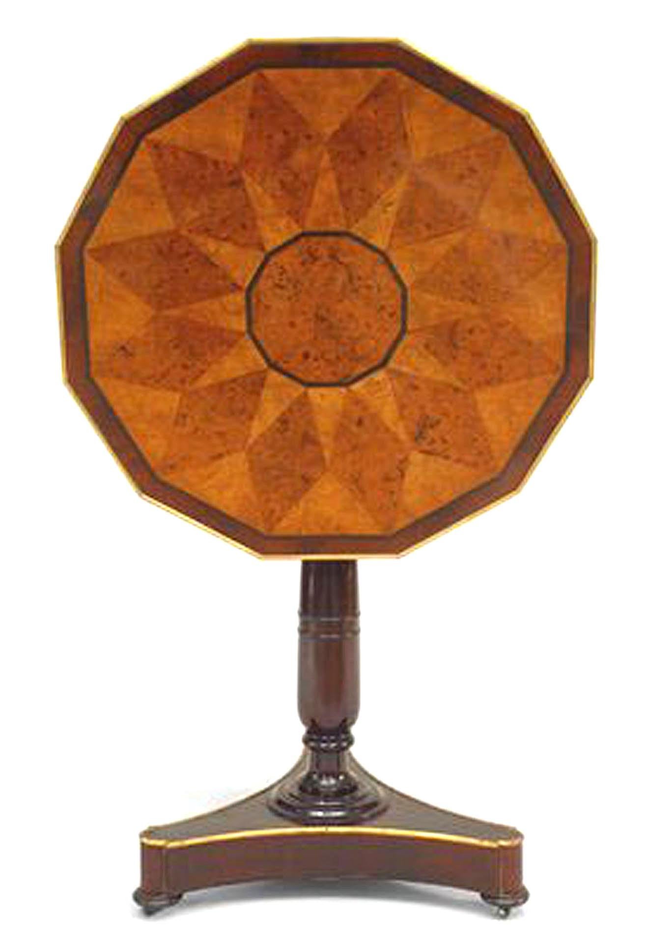 Russian Neoclassic (19th Century) brass mounted mahogany tilt-top table with 12-sided specimen wood parquetry top above an incurved tripartite base
