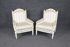 19th c Pair Louis XVI Style Creme Painted with Gilt Accent Bergere Chairs