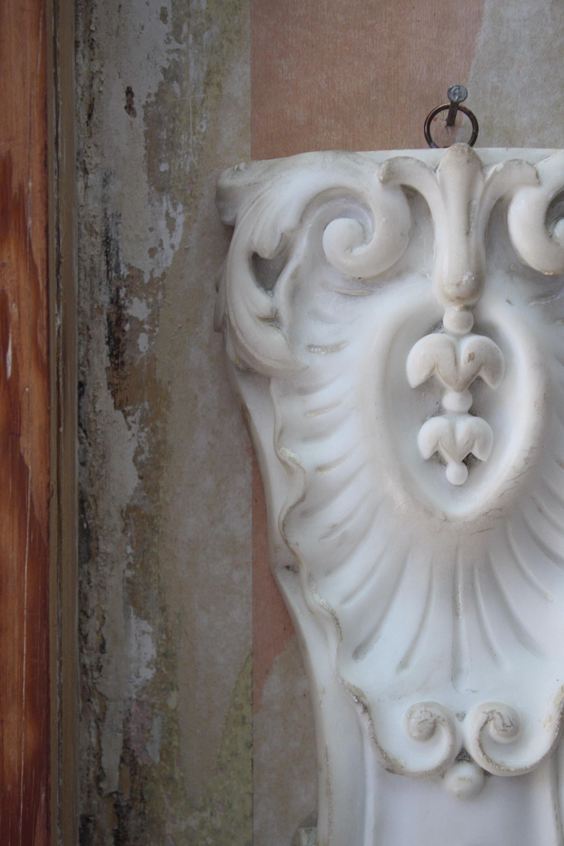 Pair of 19th century carved marble decorative tablets with organic following line s very much in the rococo revival style, previously part of larger interior architectural feature

The sections are extremely well carved, crisp and have a good