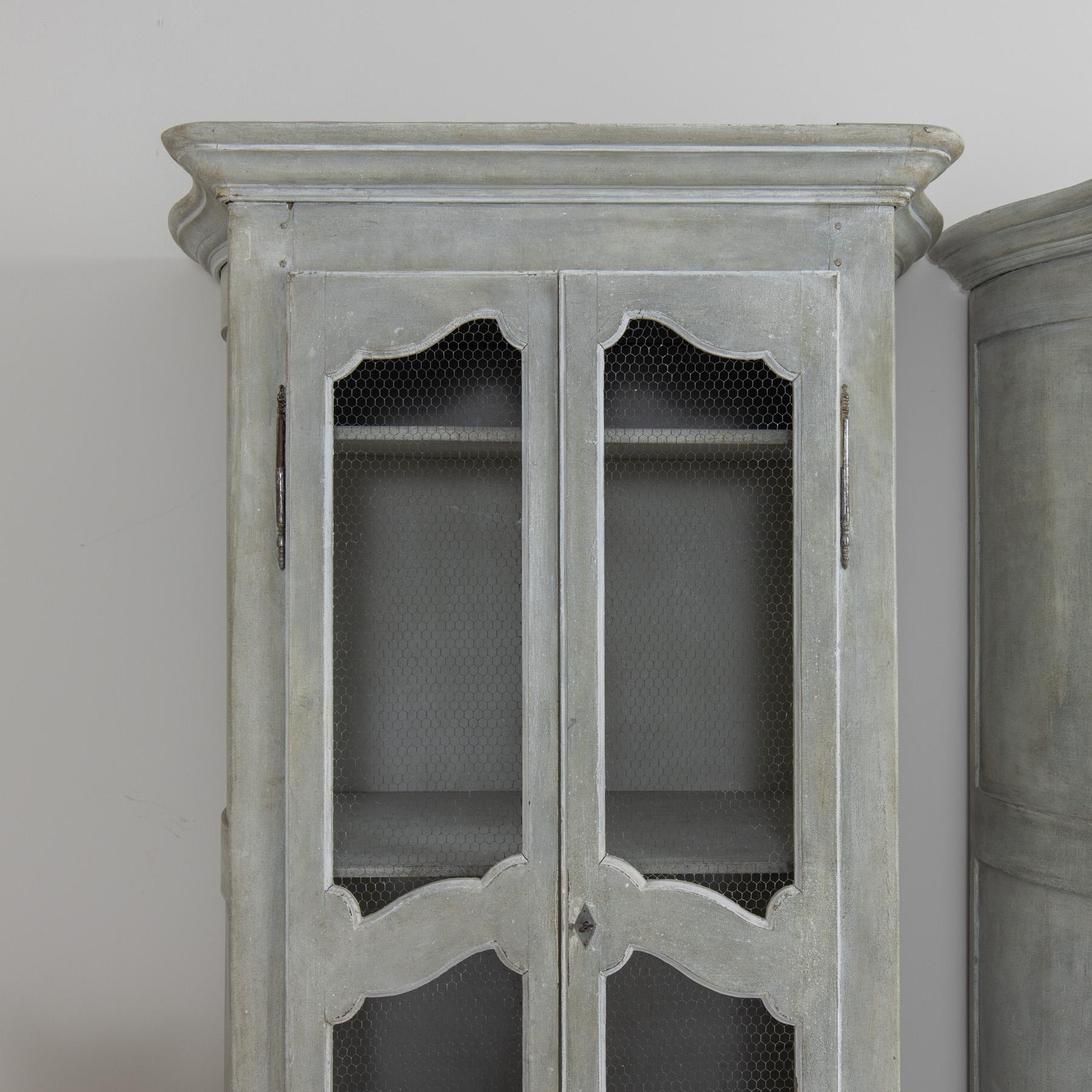 Hand-Carved 19th c. Pair of French Gray Painted Armoire Cabinets with Serpentine Sides For Sale