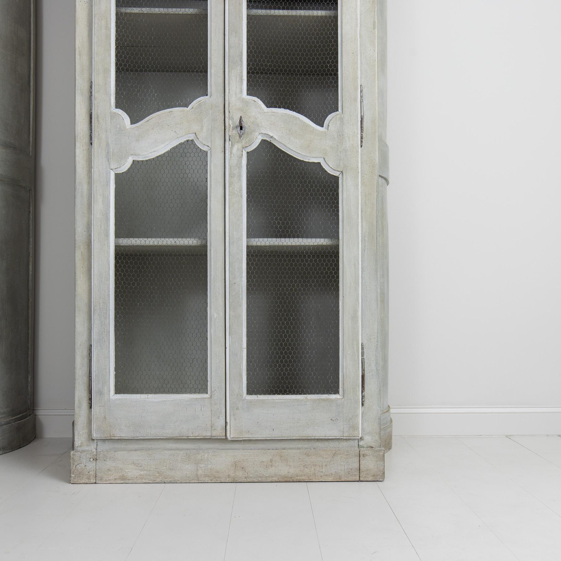 Wire 19th c. Pair of French Gray Painted Armoire Cabinets with Serpentine Sides For Sale