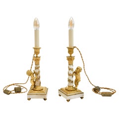 19th c. pair of gilt bronze and marble French candlestics in the style of Louis