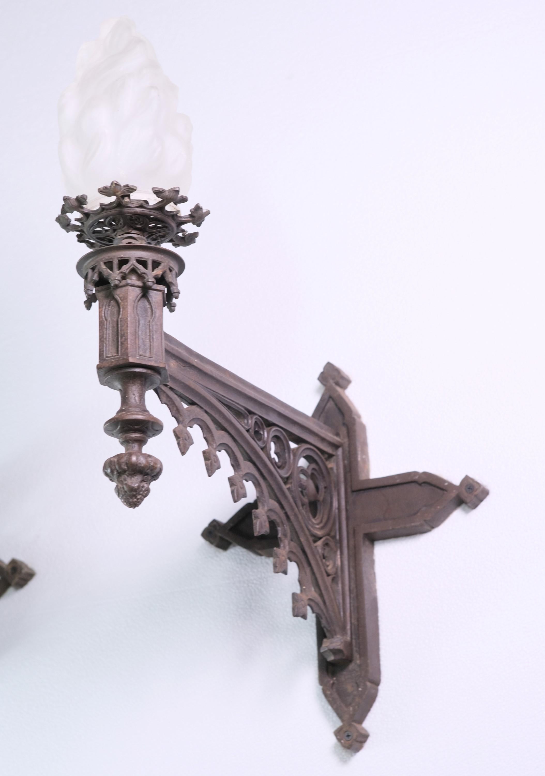 American Pair of Gothic Cast Iron Wall Sconces with Flame Shades For Sale